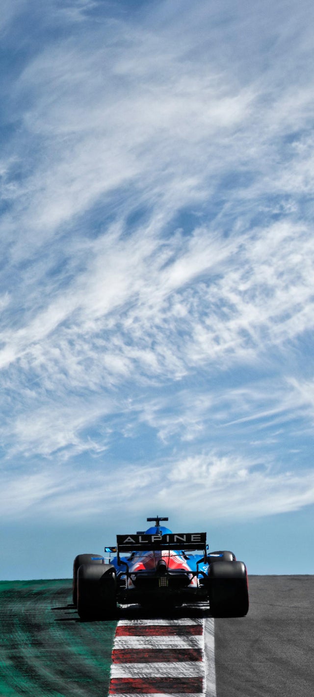 A quick edit I made for a mobile phone wallpaper. Fernando Alonso heading over the crest at Portimao (1440x3200)