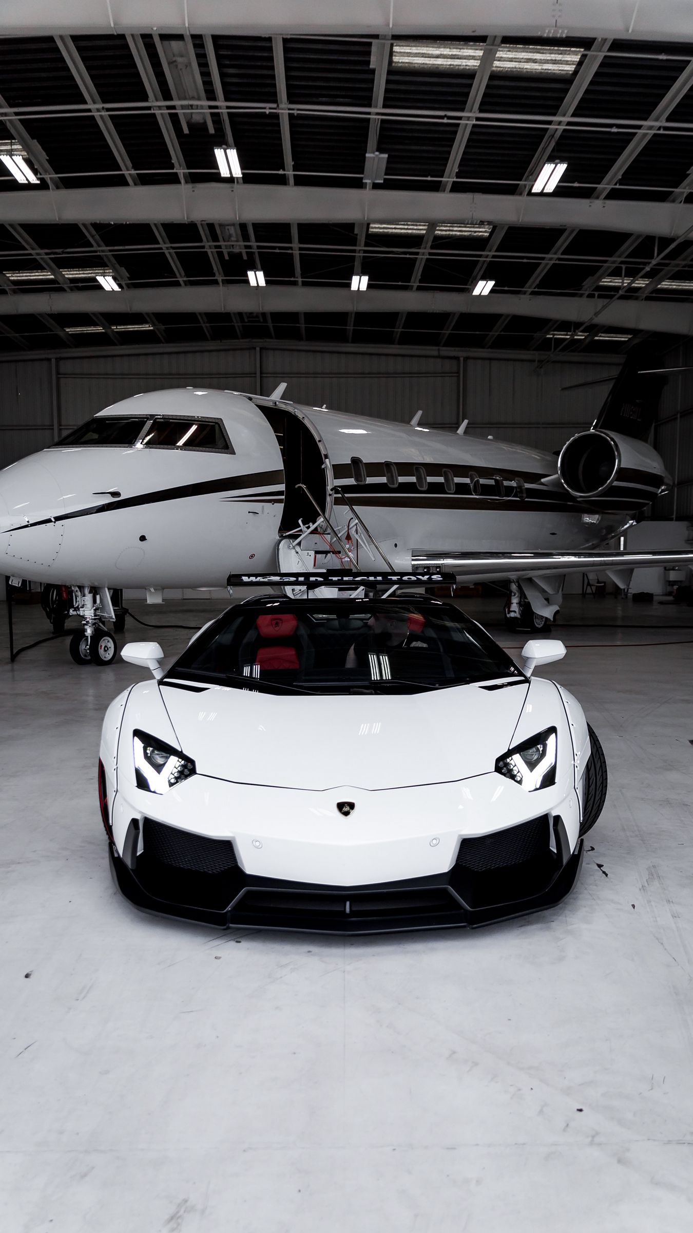Download wallpaper 1350x2400 lamborghini aventador, lamborghini, plane, luxury, sports car iphone 8+/7+/6s+/for parallax HD background