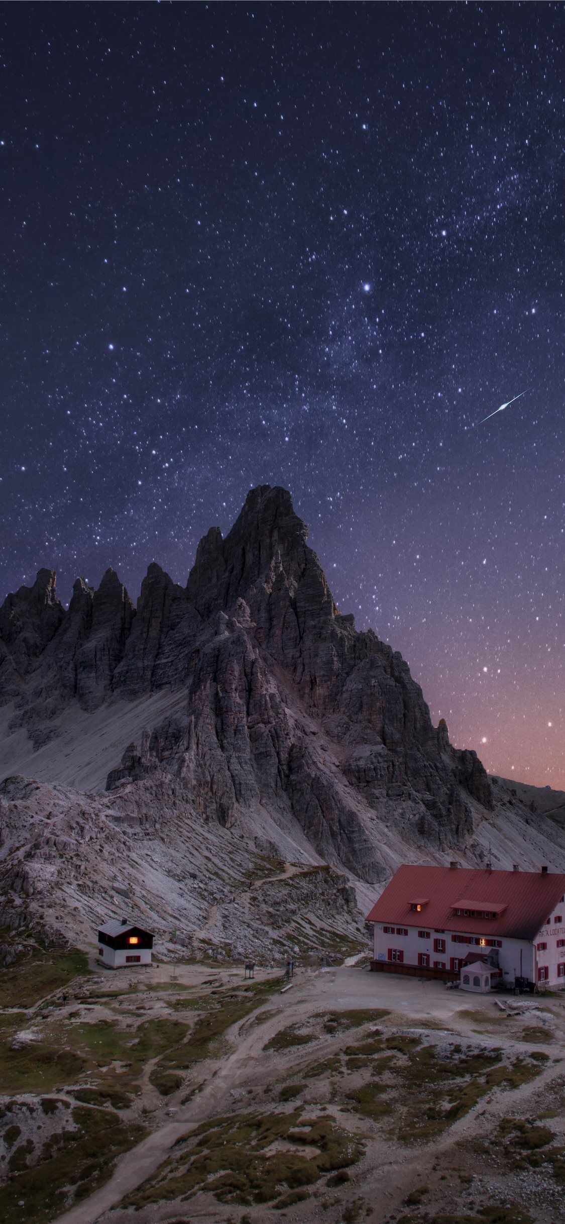 brown and white house on snowcape mountain iPhone 11 Wallpaper