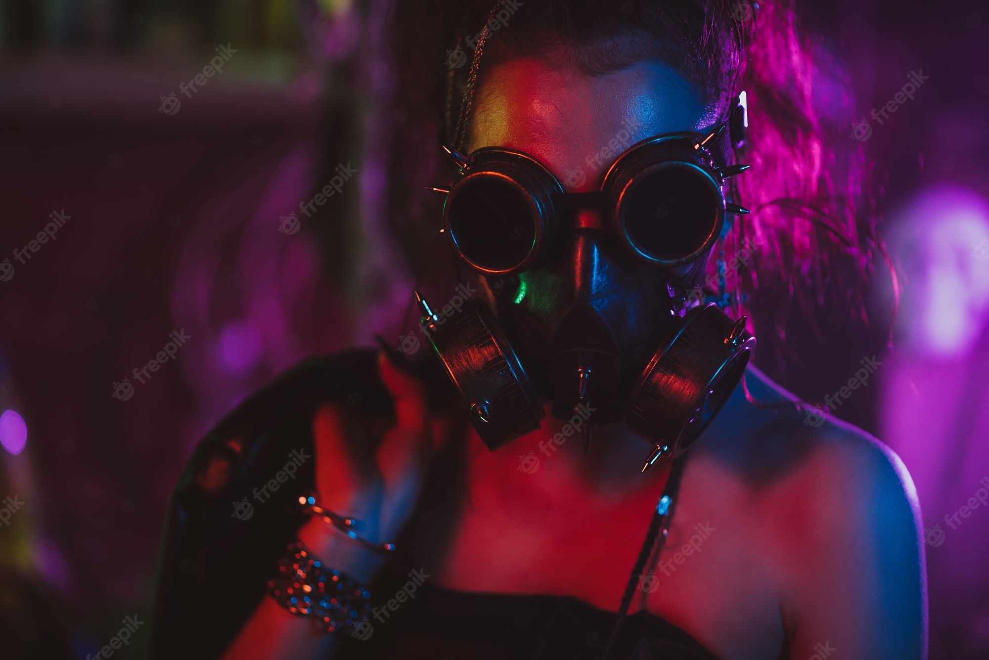 Premium Photo. Portrait Of A Cyberpunk Girl In A Gas Mask And Glasses In The Style Of The Post Apocalypse. Steampunk Style With Neon Light
