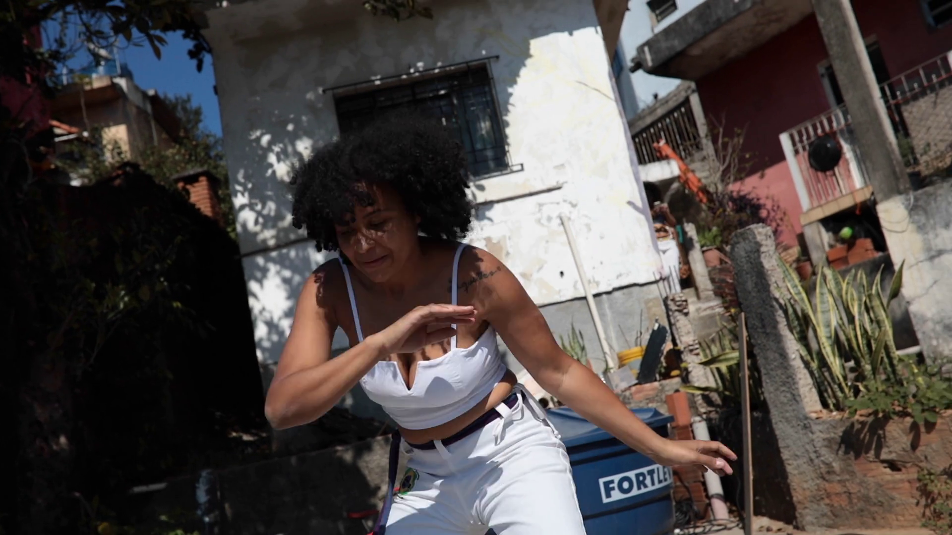 Black Woman Performing Capoeira Kicks And Dancing To The Camera Stock Video Footage 00:34 SBV 346648839