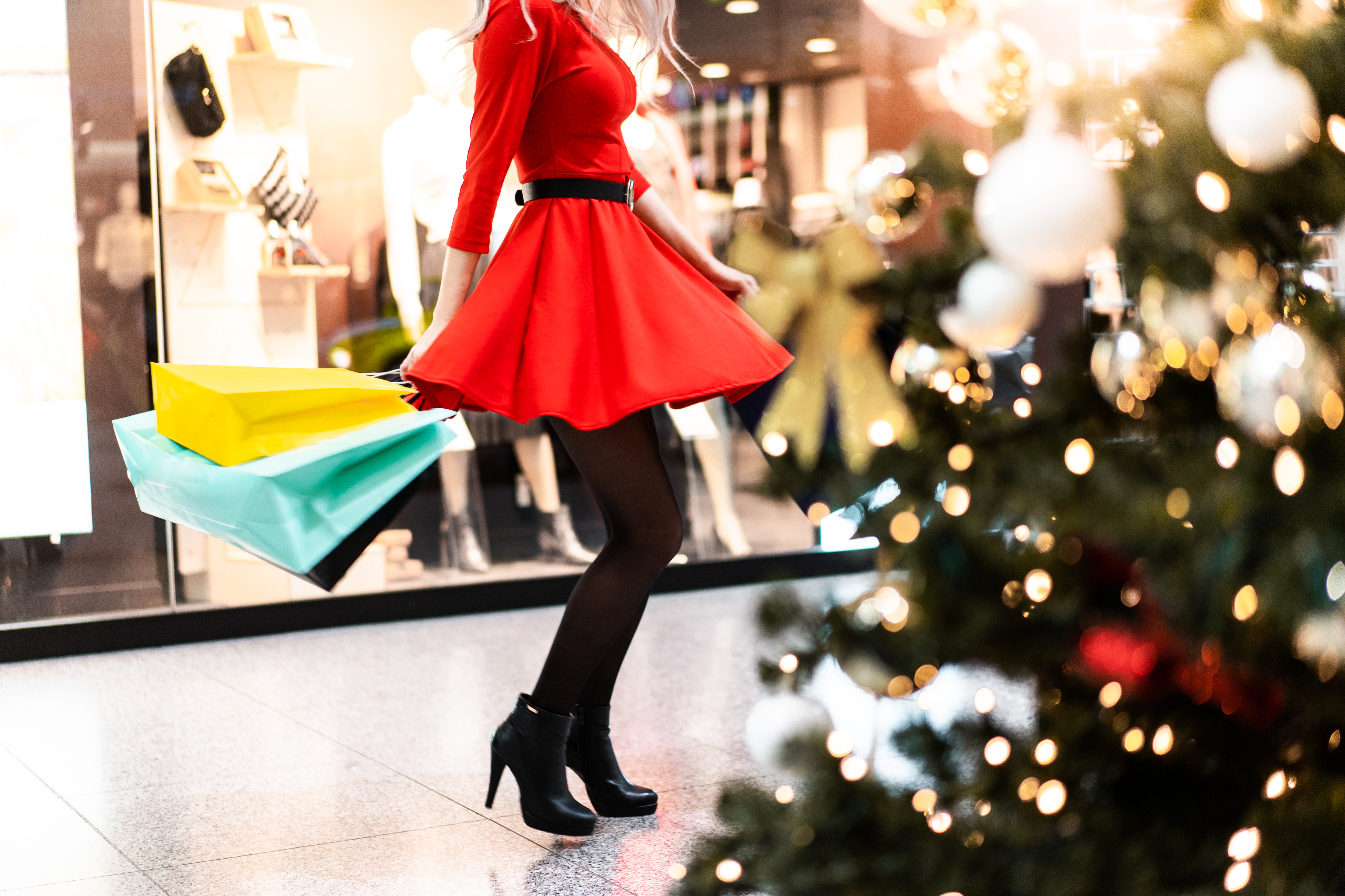 Woman in Red Dress Enjoying Christmas Shopping Free