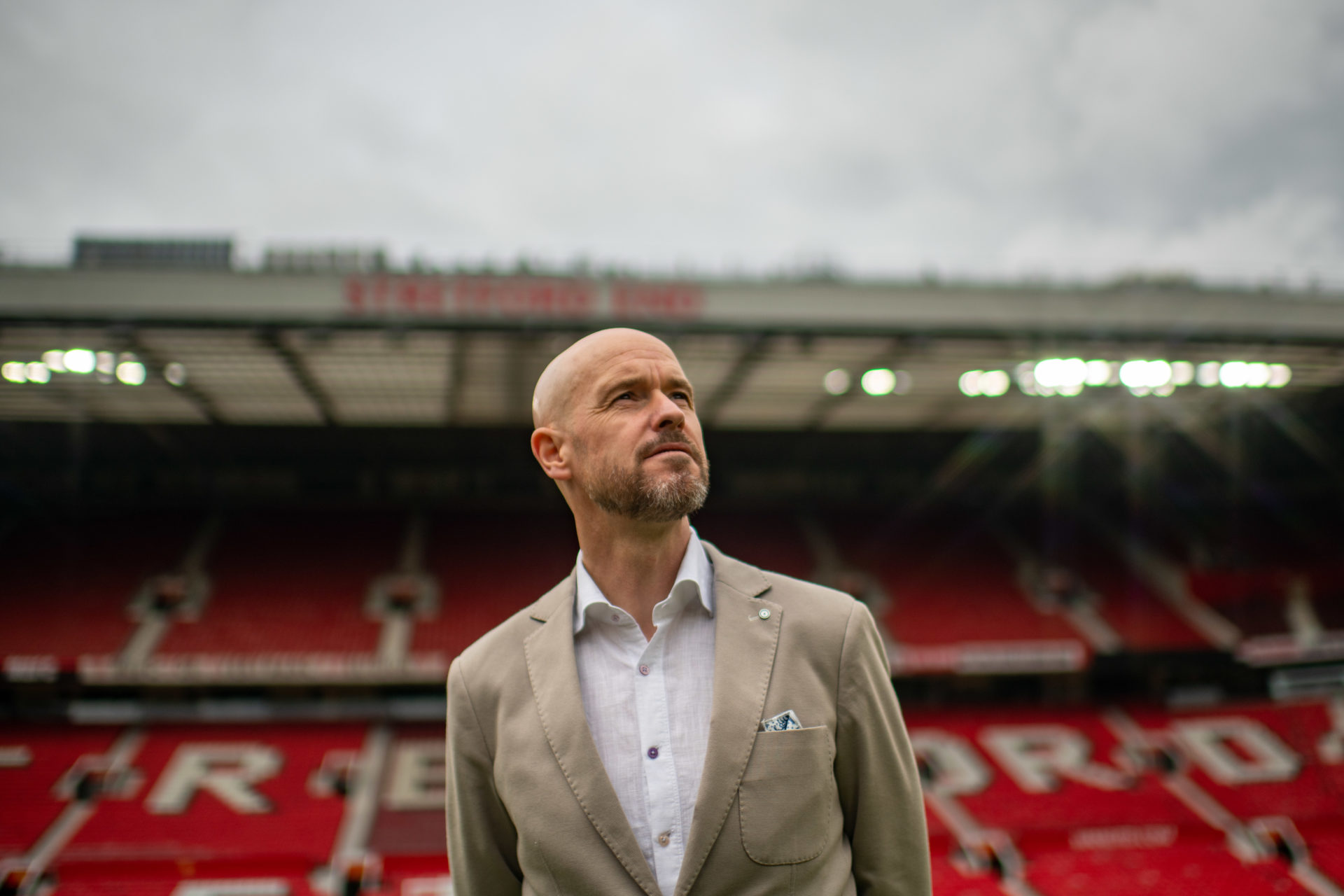 Erik ten Hag pictured at Old Trafford holding Manchester United shirt