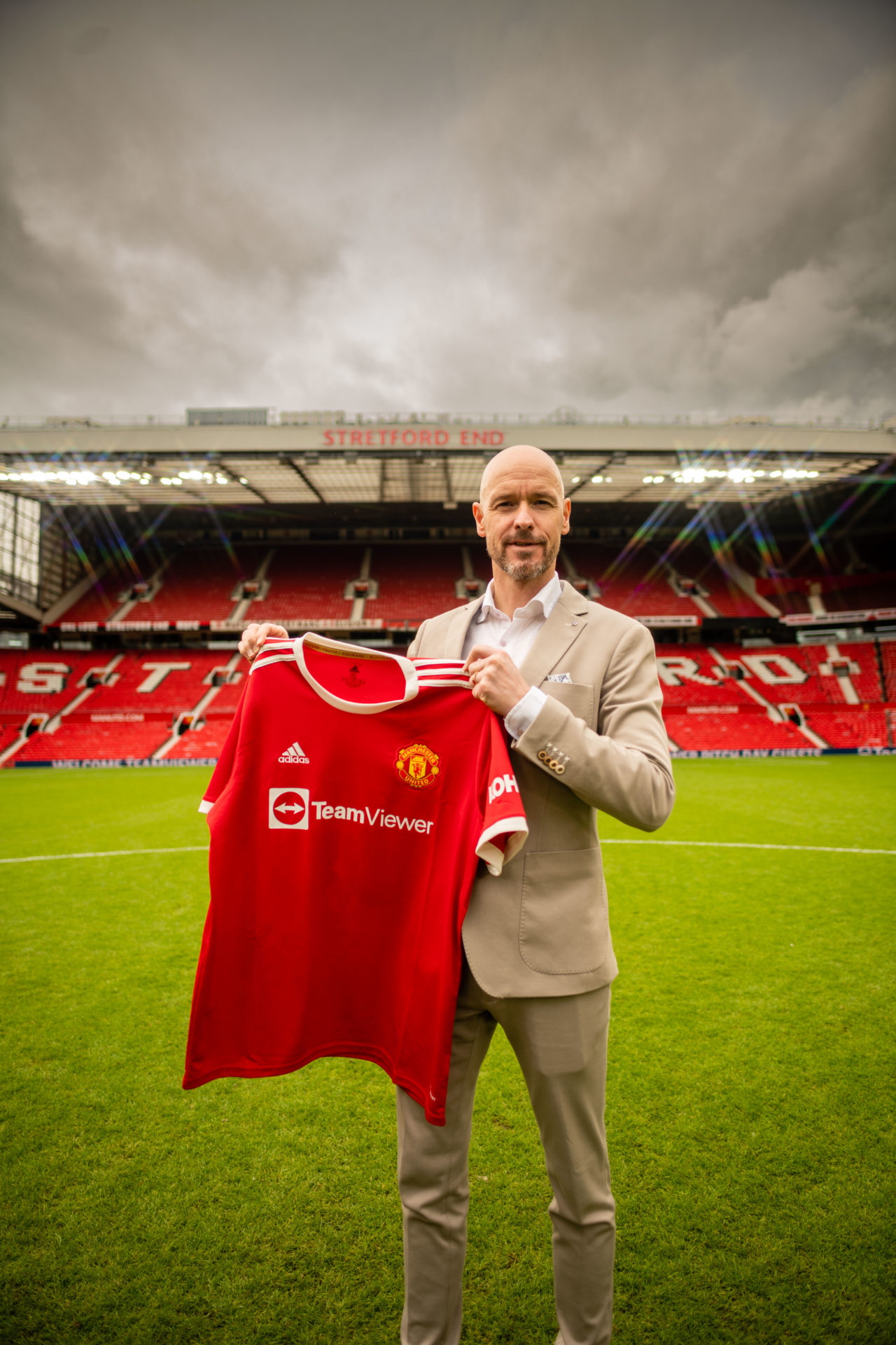 Erik ten Hag pictured at Old Trafford holding Manchester United shirt