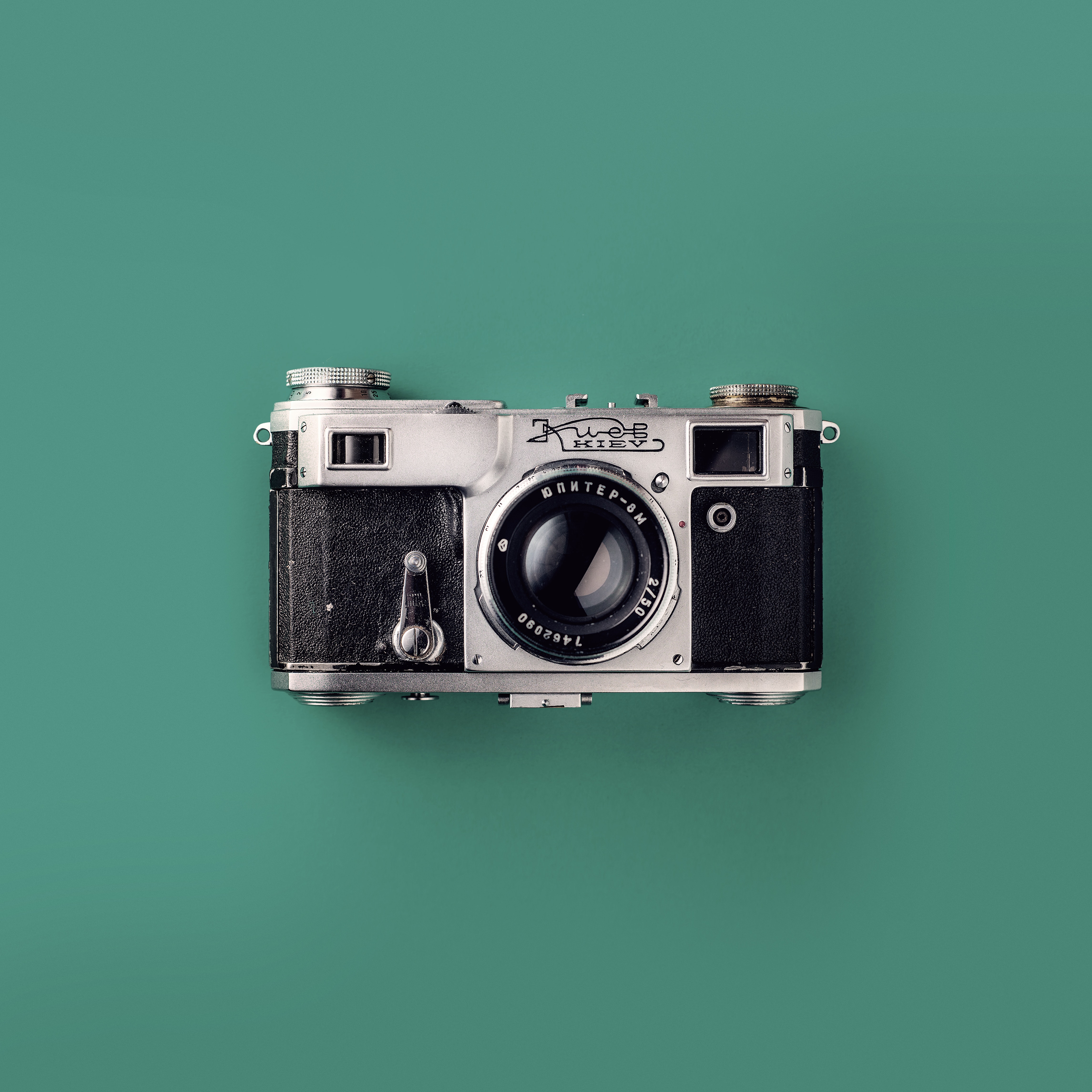 Grey and Black Camera On Green Background · Free