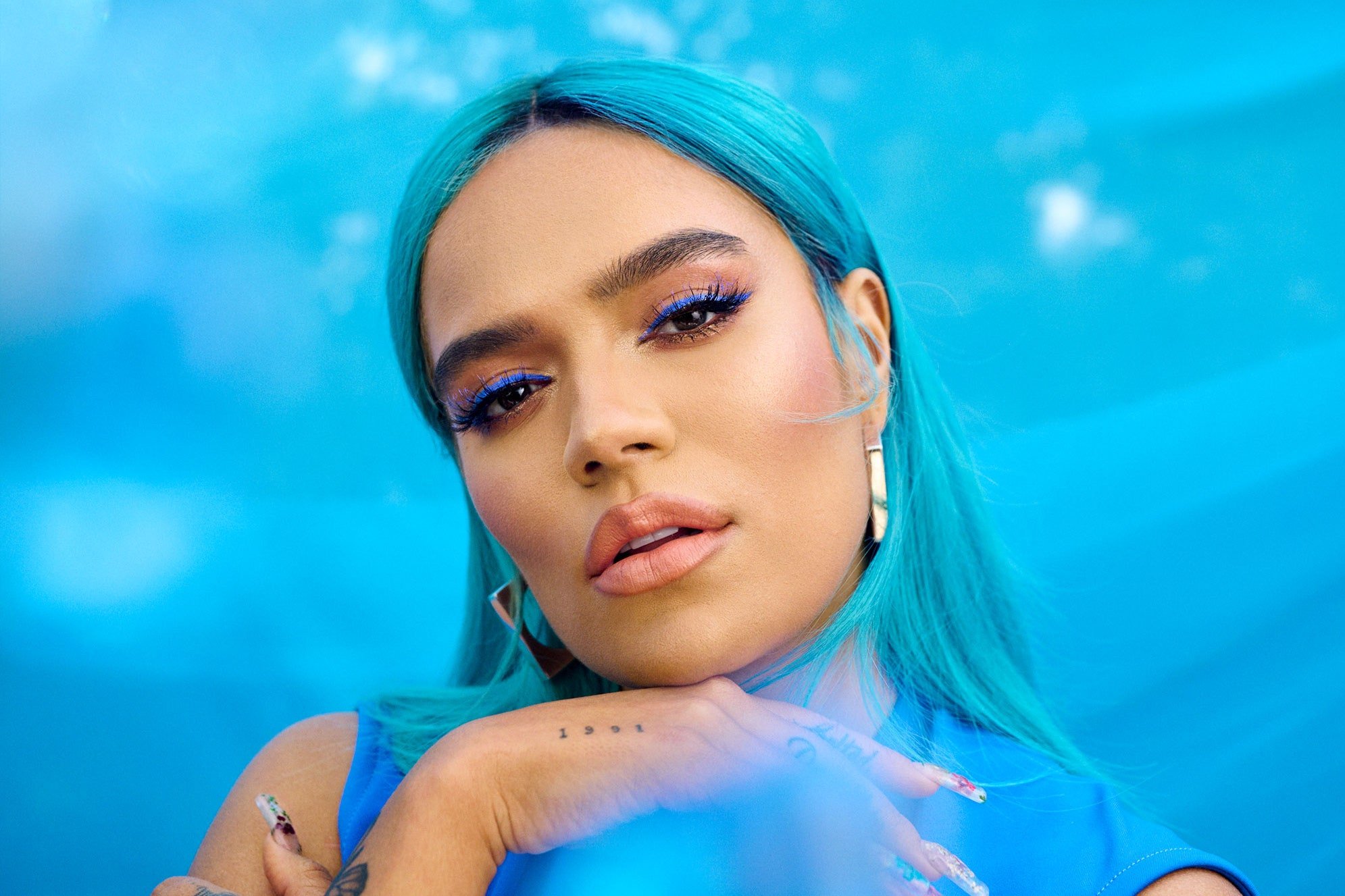 Karol G Reveals the Meaning Behind Her Barbed Heart Tattoo