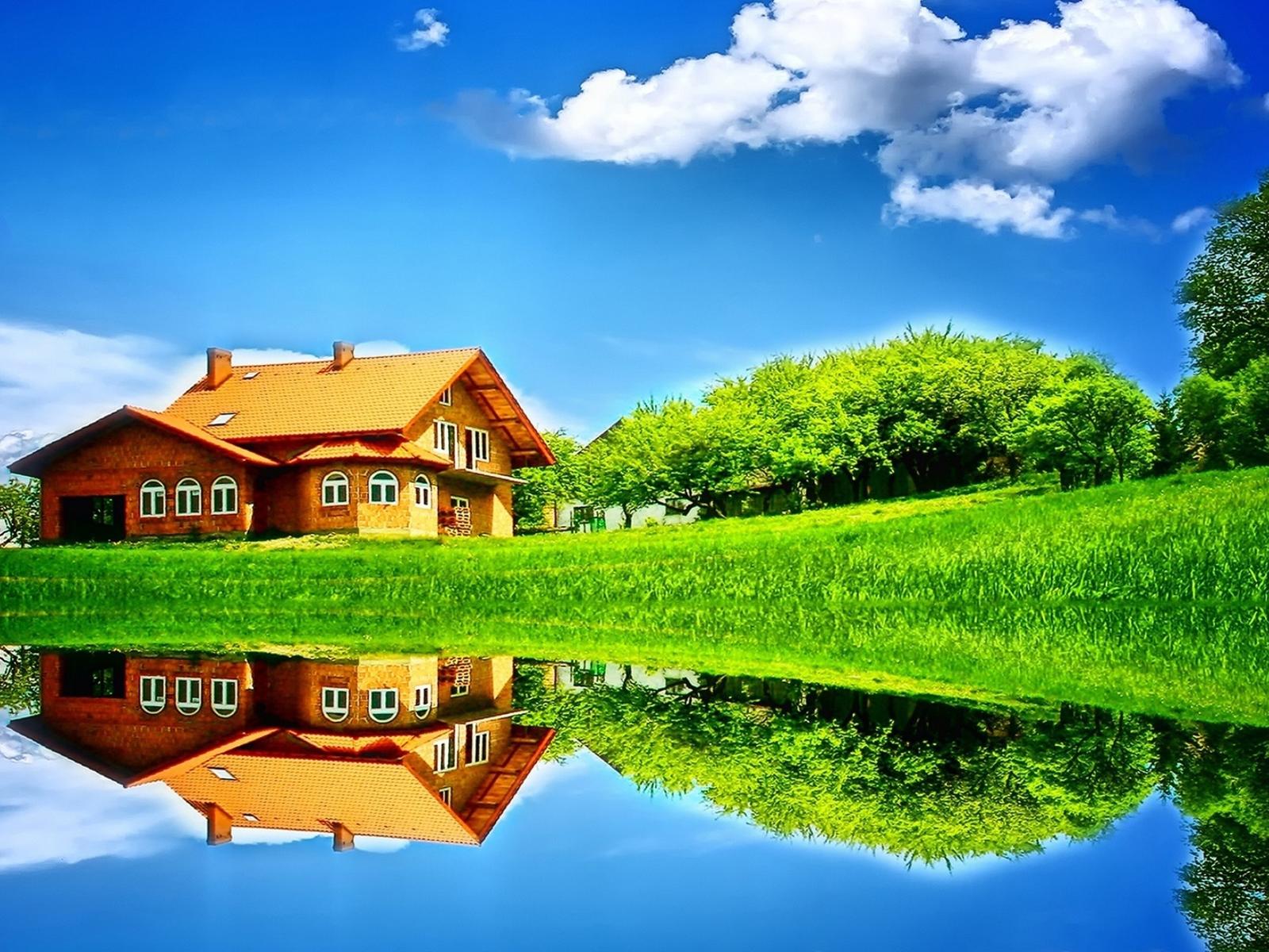Wonderful house mirror in the lake summer day
