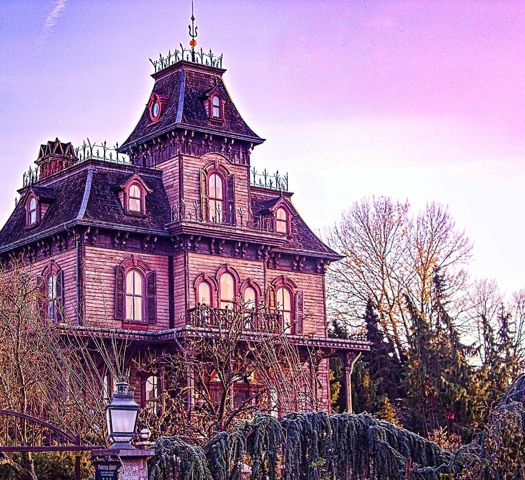 Phantom Manor haunted house at sunset in Frontierland, Disneyland Paris DLP Disney. Disneyland paris, Disneyland, Holiday travel