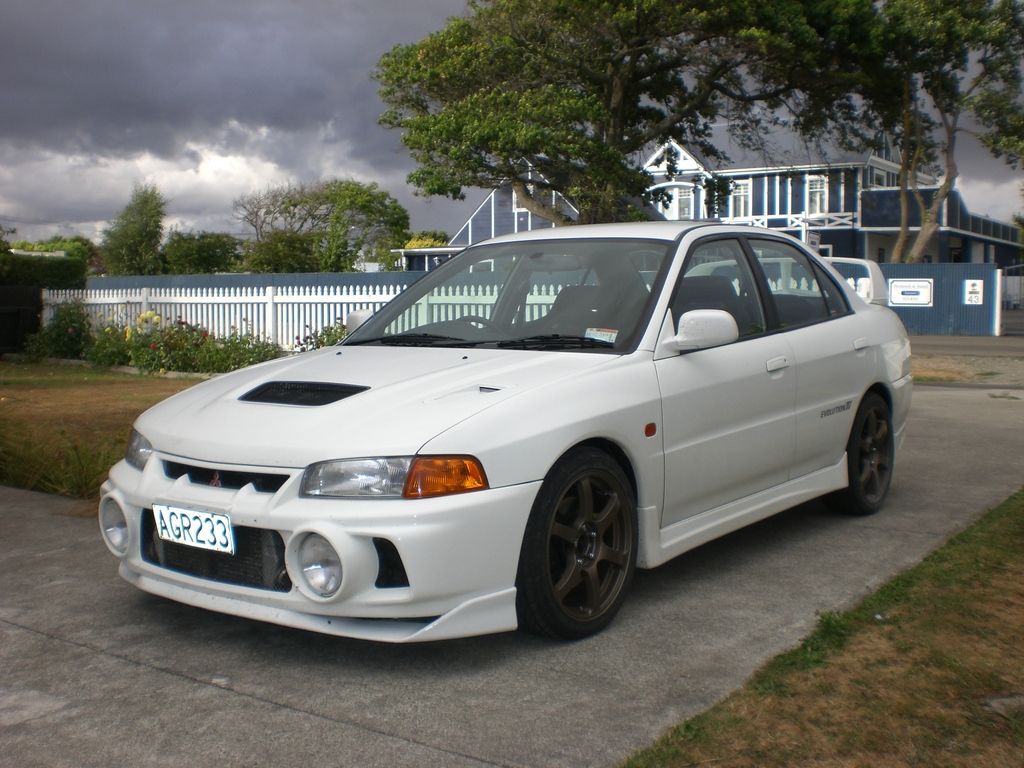 Evo IV. One of my favorite cars from one of my favorite movies. Jackie Chans Who Am I. Mitsubishi cars, Mitsubishi lancer, Mitsubishi lancer evolution
