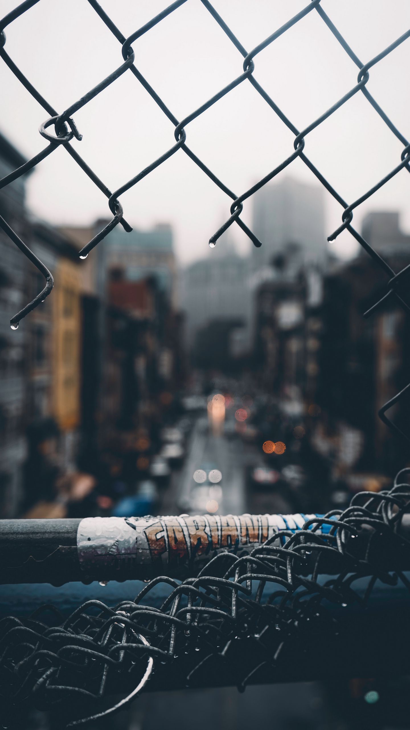 Fence grid hole rain city blur wallpaper 13 pro max Wallpaper, iPhone 12 Background, iPhone Wallpaper, iPhone background., WallpaperUpdate, Best iPhone Wallpaper and iPhone background