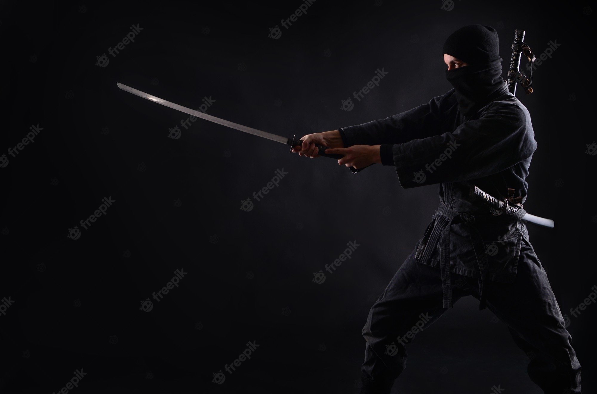 Sketch design mascot man posing with two ninja sword katanas Stock Photo -  Alamy