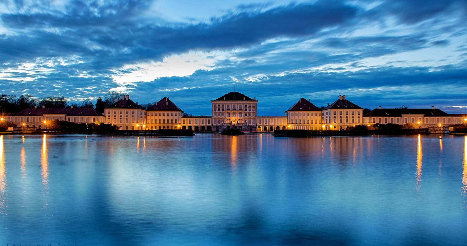 Download Nymphenburg Palace Munich During Night Wallpaper