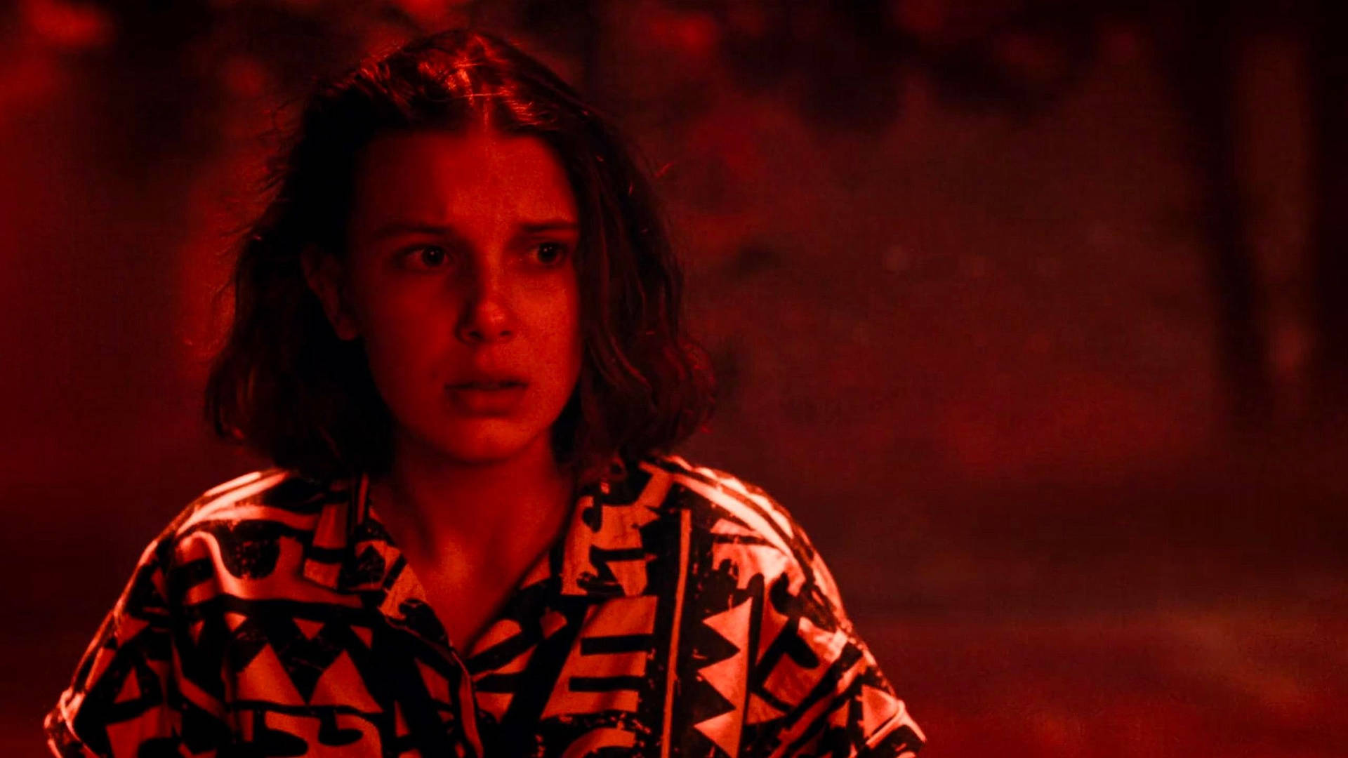 Download Eleven From Stranger Things In Red Filter Wallpaper