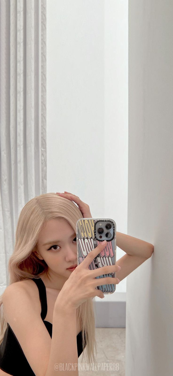 BLACKPINK's Rosé Wears Wildflower Phone Case and String Ting for Her Latest  OOTD