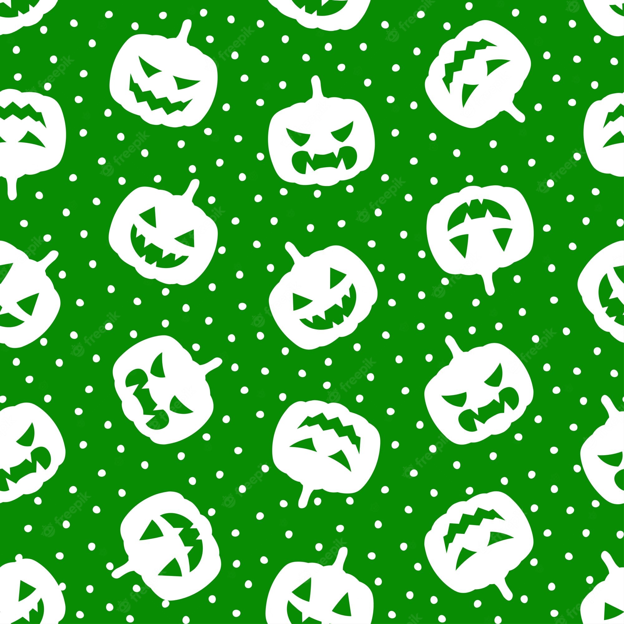 Premium Vector. Green seamless pattern with white halloween pumpkin