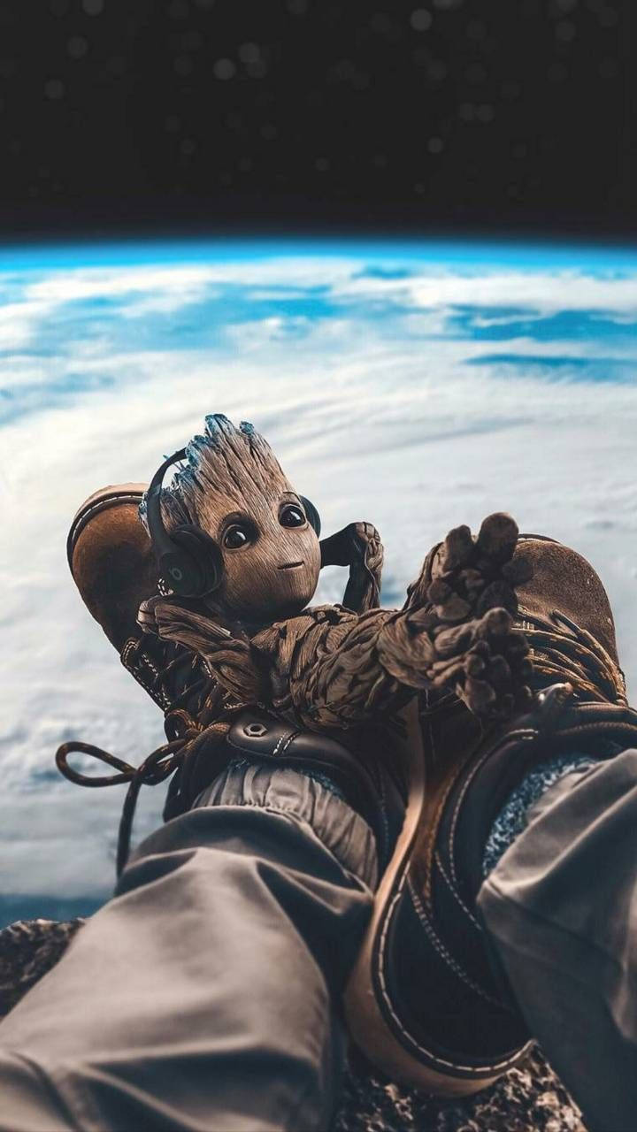 Download Groot With Headphones Wallpaper