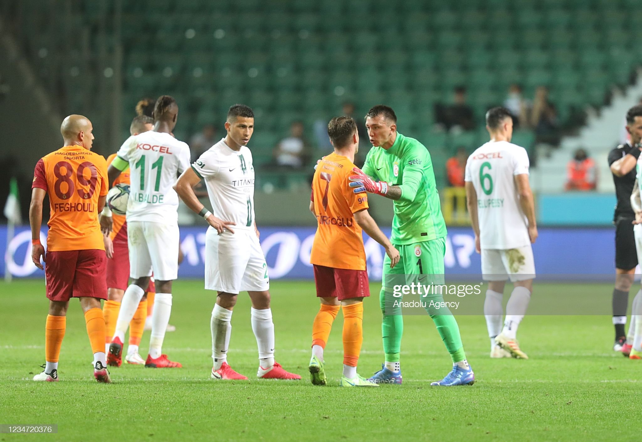 Fernando Muslera of Galatasaray speaks to teammate Kerem Akturkoglu. News Photo