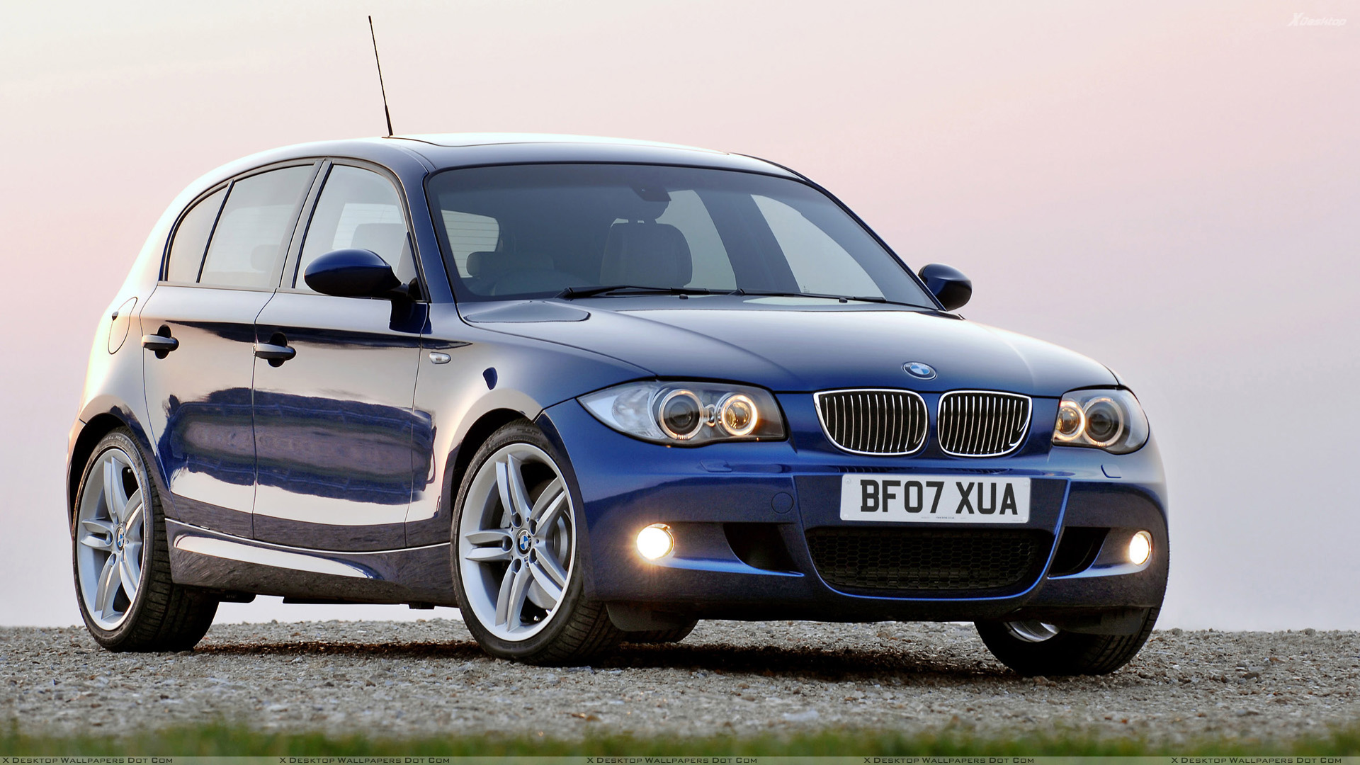 BMW 1 Series M Sport Front Side Pose In Blue Wallpaper