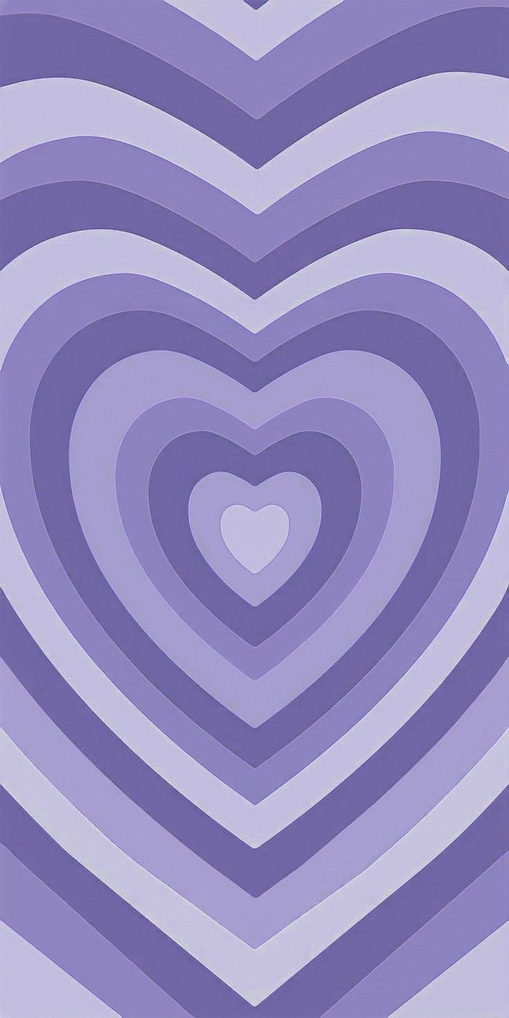 Tông màu tím hoa nữ tính được nhấn nhá với các yếu tố đặc trưng của thập niên 2000, bức ảnh Purple Y2K Wallpapers sẽ mang đến cho bạn sự mới lạ và đầy cá tính. Đây chắc chắn là một lựa chọn tuyệt vời để cập nhật không gian làm việc hoặc trang trí chiếc điện thoại của bạn.