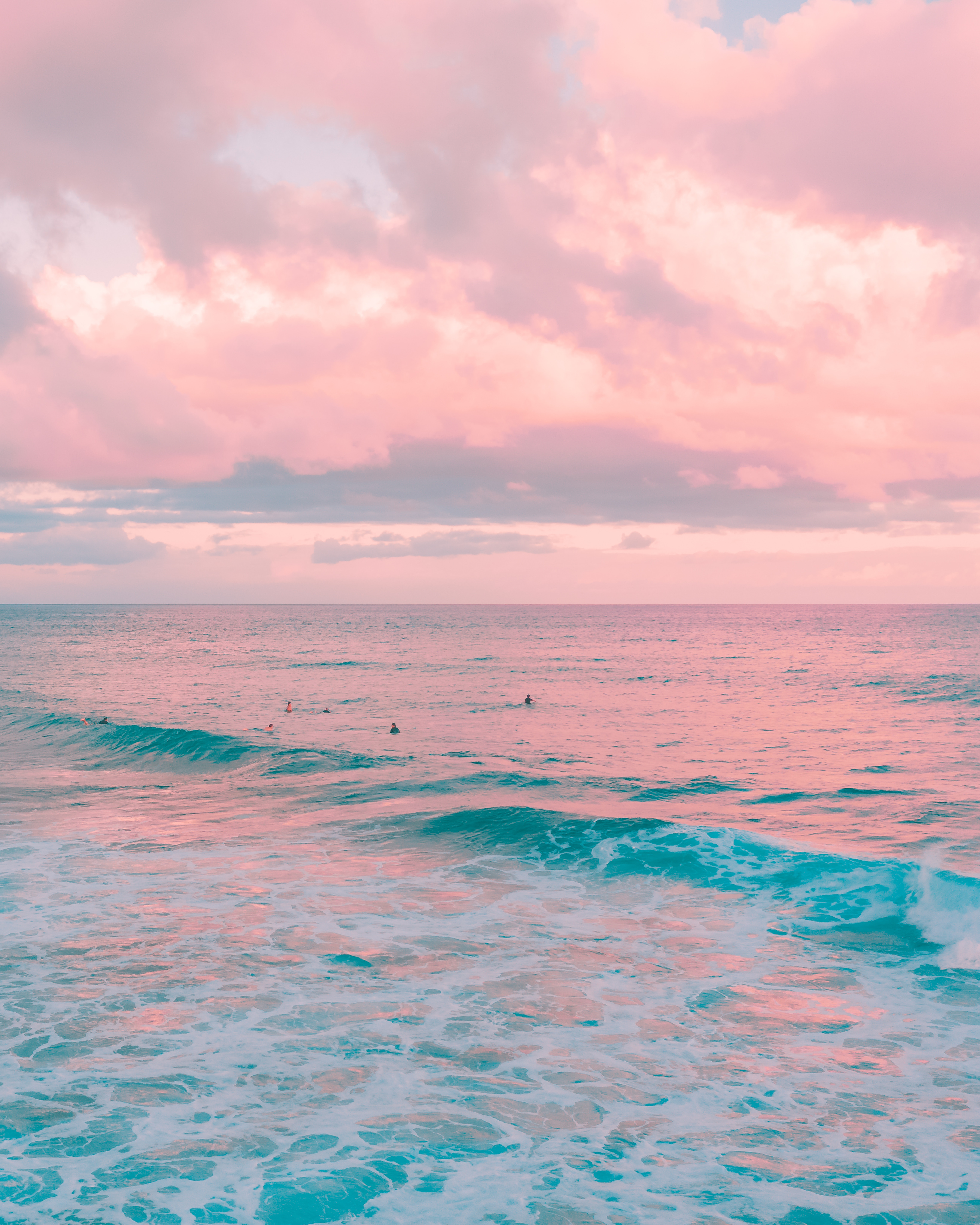 Blue Ocean Water Under White Clouds on Pink Sky · Free