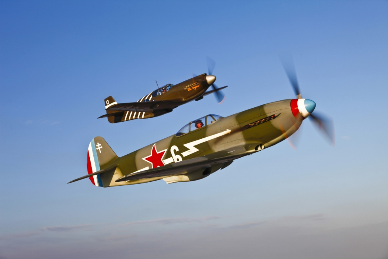 A Yakovlev Yak 9 Fighter Plane And A North American P 51A Mustang In Flight Near Chino, California Poster Print # VARPSTSGR100166M