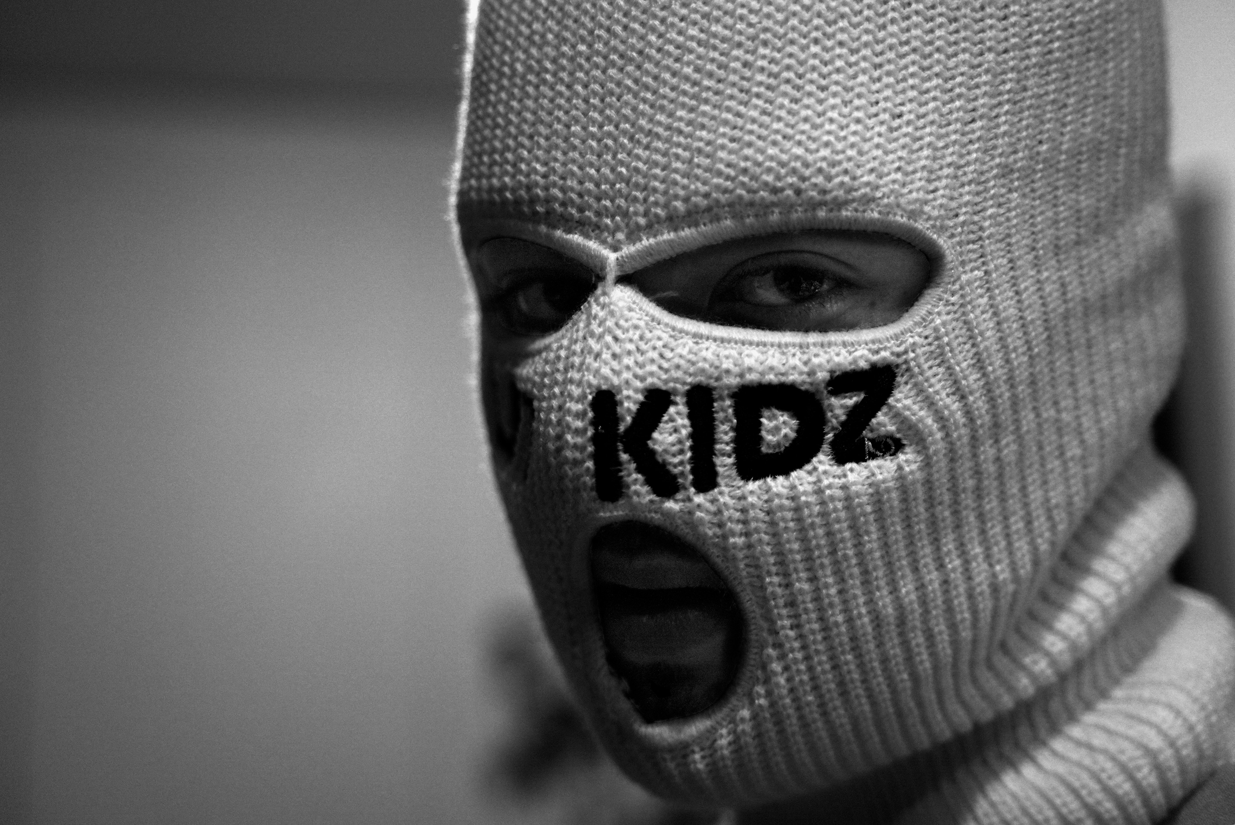 Black and White Photo of a Man Wearing a Ski Mask · Free