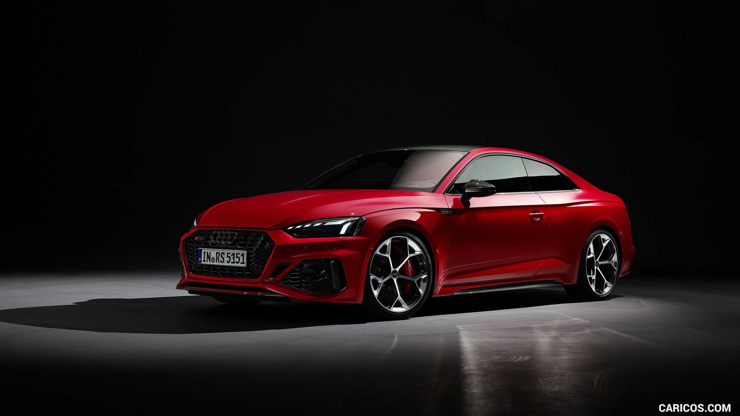 2023 Audi RS 5 Coupé Competition Plus (Color: Tango Red) Three Quarter