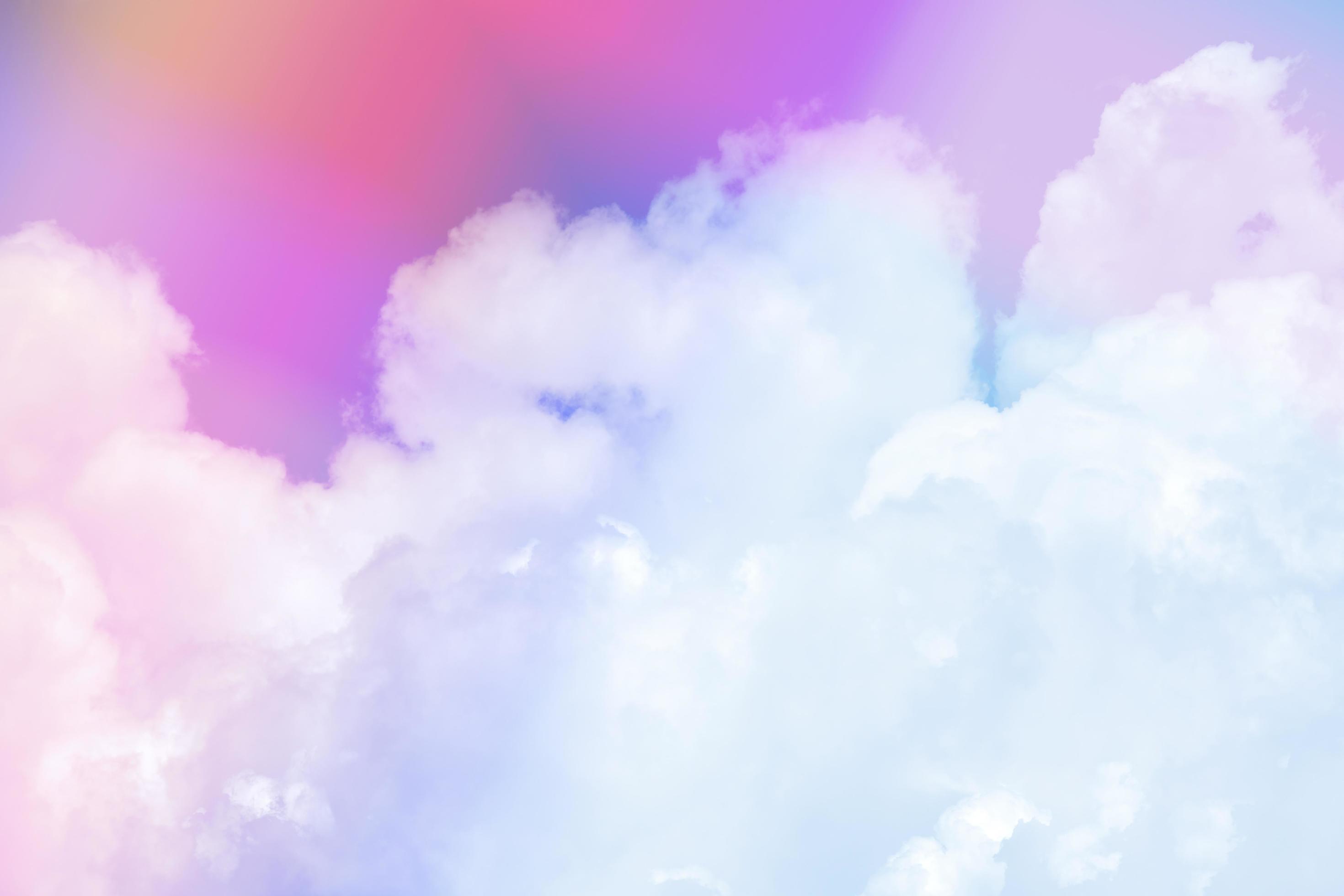 beauty sweet pastel red purple colorful with fluffy clouds on sky. multi color rainbow image. abstract fantasy growing light