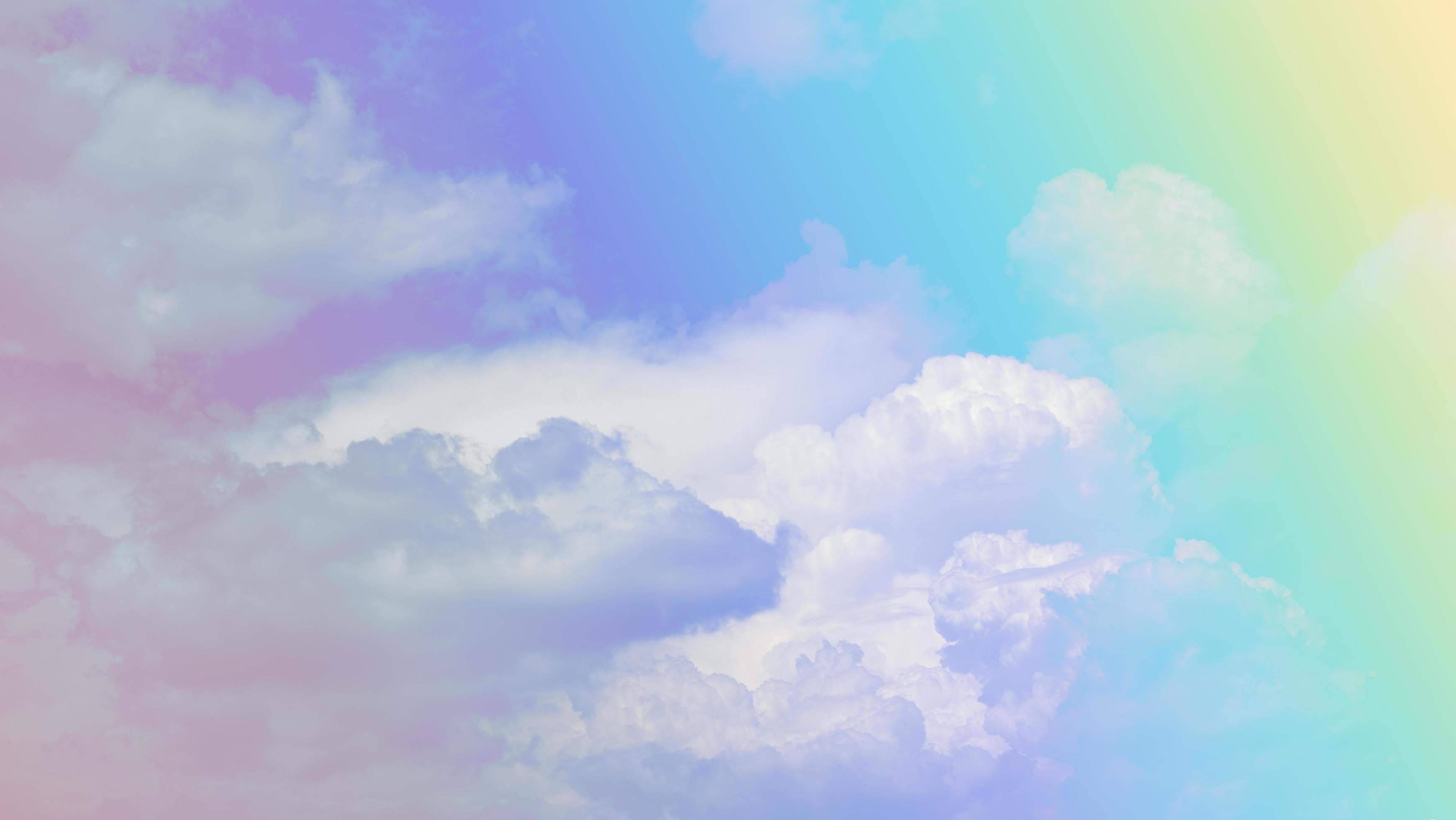 beauty sweet pastel yellow purple colorful with fluffy clouds on sky. multi color rainbow image. abstract fantasy growing light