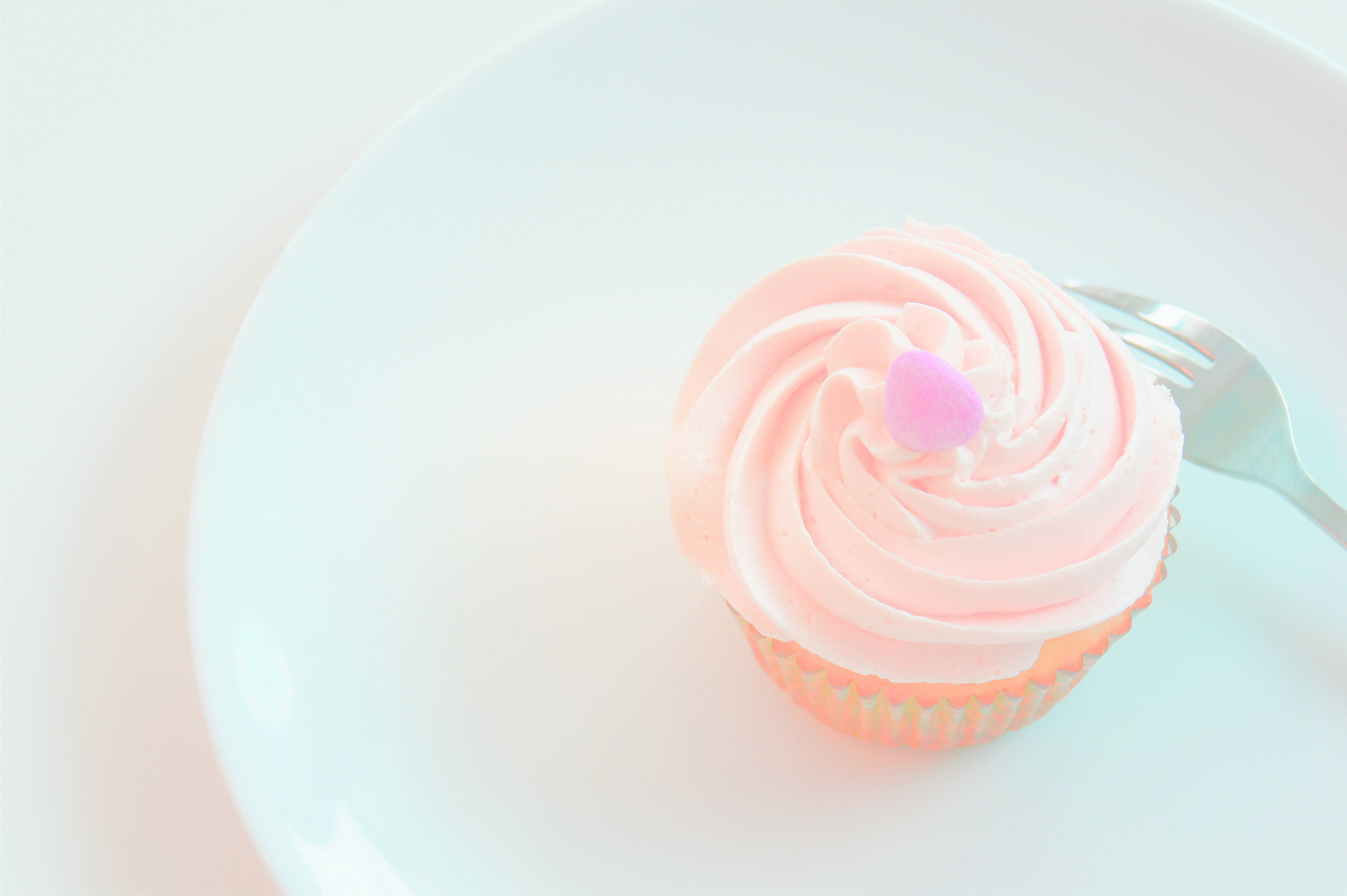 Download Pink Pastel Frosting Cupcake Wallpaper