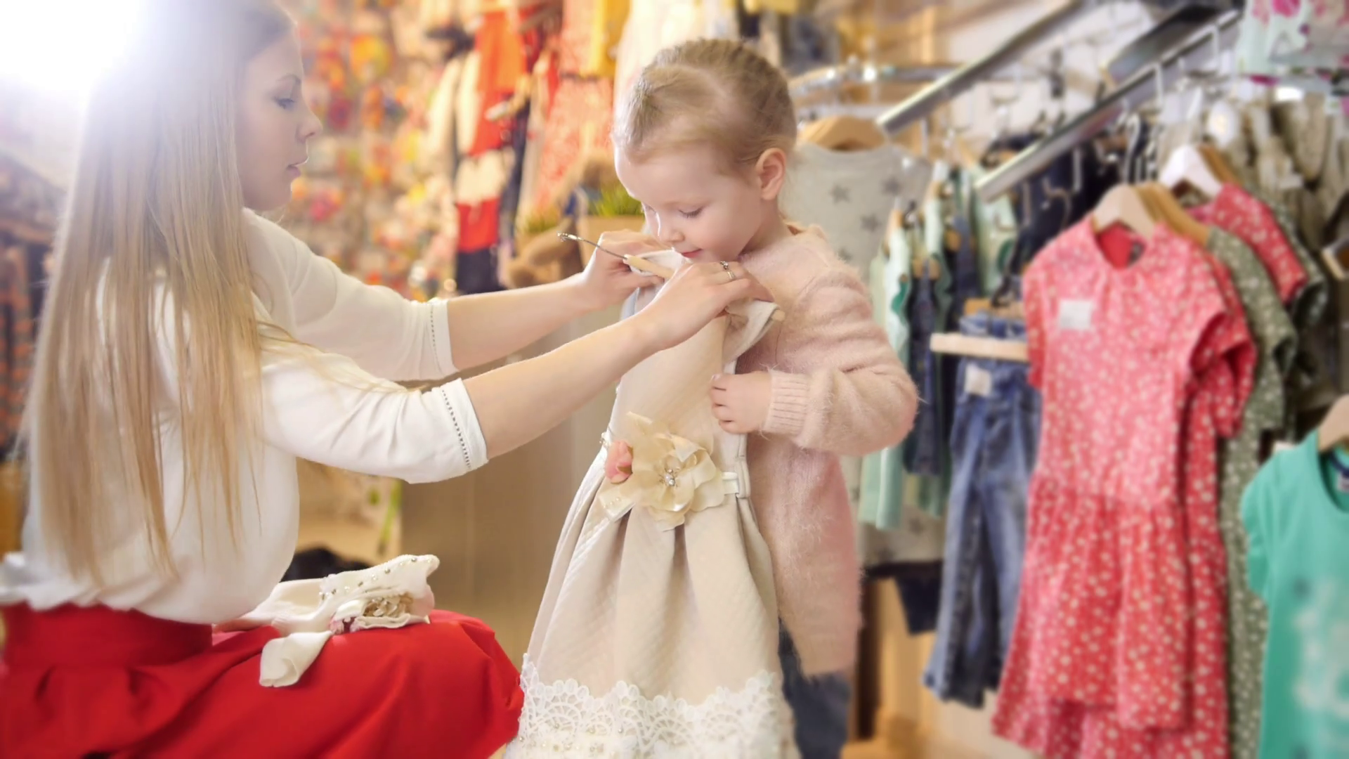 Shopping For Kids Little Girl With Mommy Buying Dress In Store Of Kids Clothes Stock Video Footage 00:06 SBV 315031354