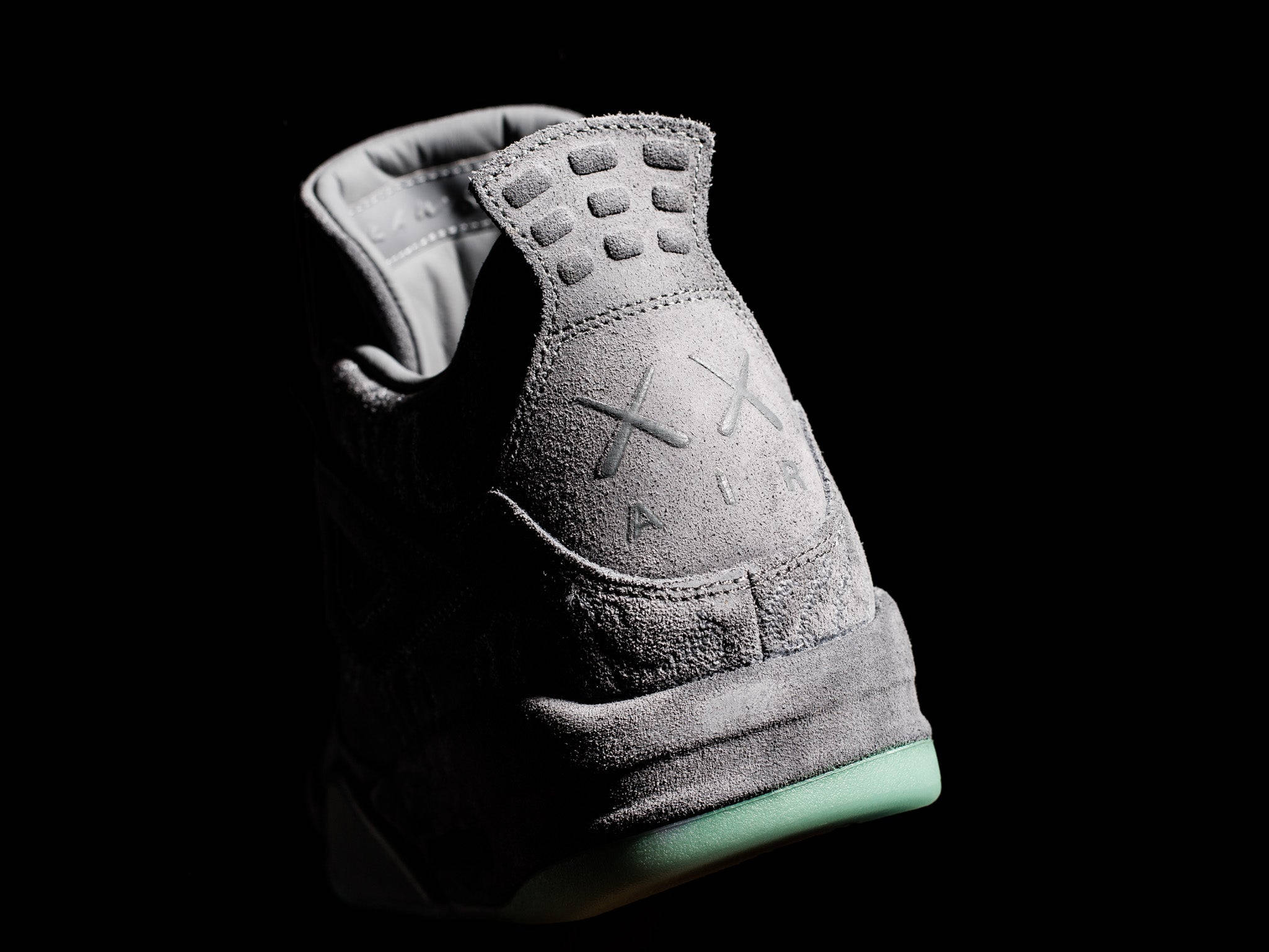 Download Kaws Air Jordan Heel Logo Wallpaper