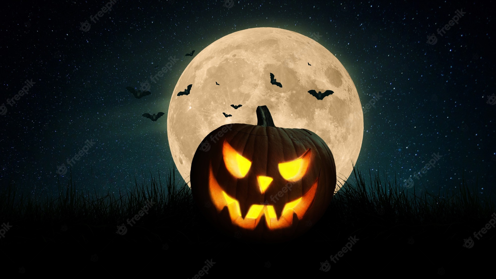 Premium Photo. Scary pumpkin and bats in a field with a full orange moon at night. happy halloween dark wallpaper