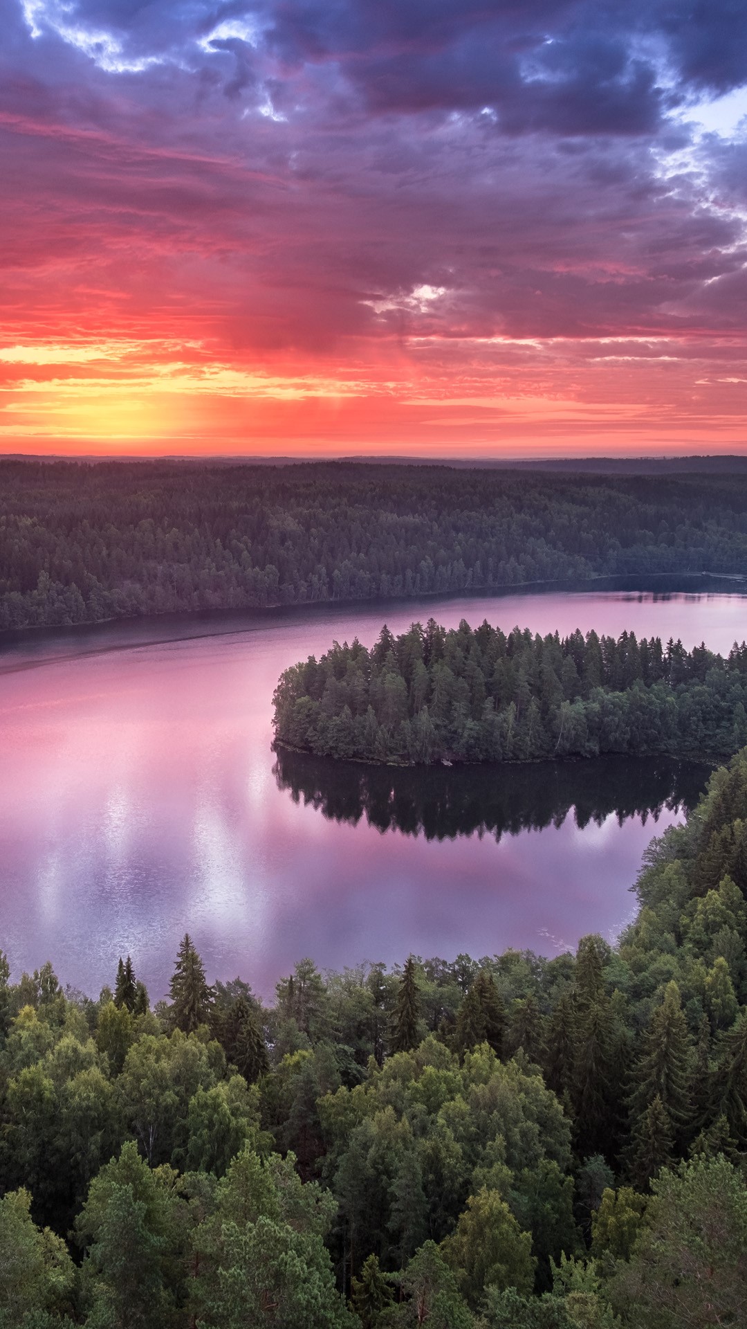 Landscape with sunrise and lake at summer in national park Aulanko, Hämeenlinna, Finland. Windows 10 Spotlight Image