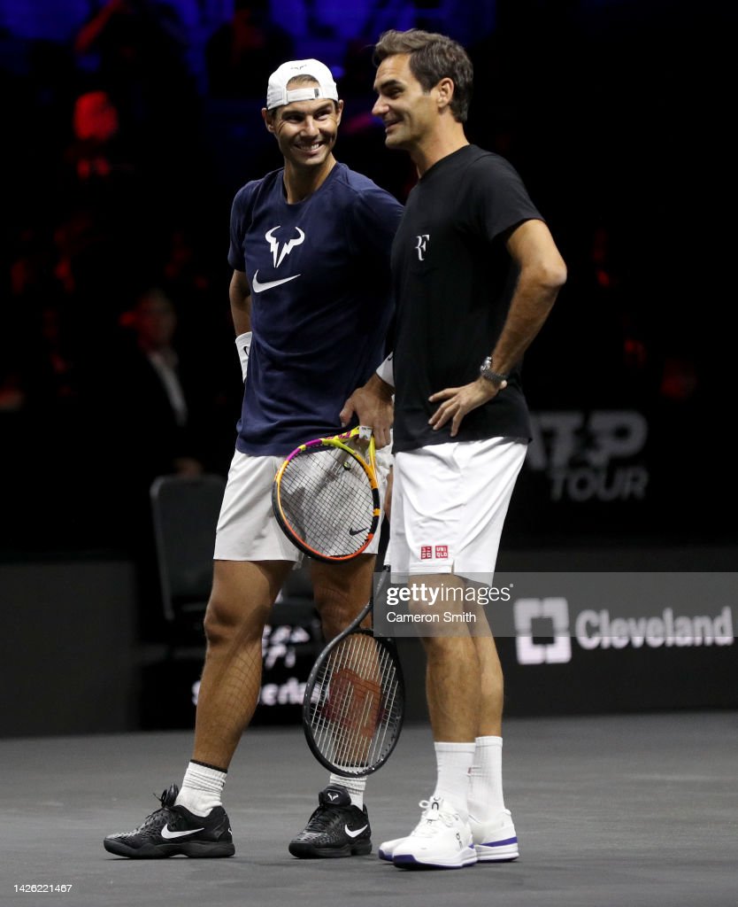 Rafael Nadal and Roger Federer of Team Europe talk during a practice. News Photo