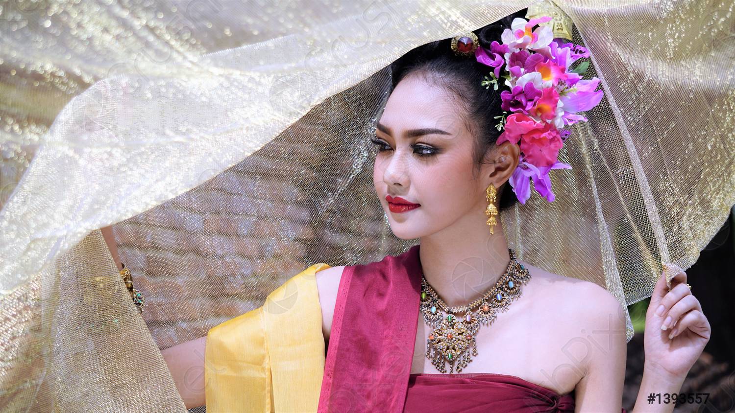 Asia woman wearing traditional Thai dressThe costume of the national