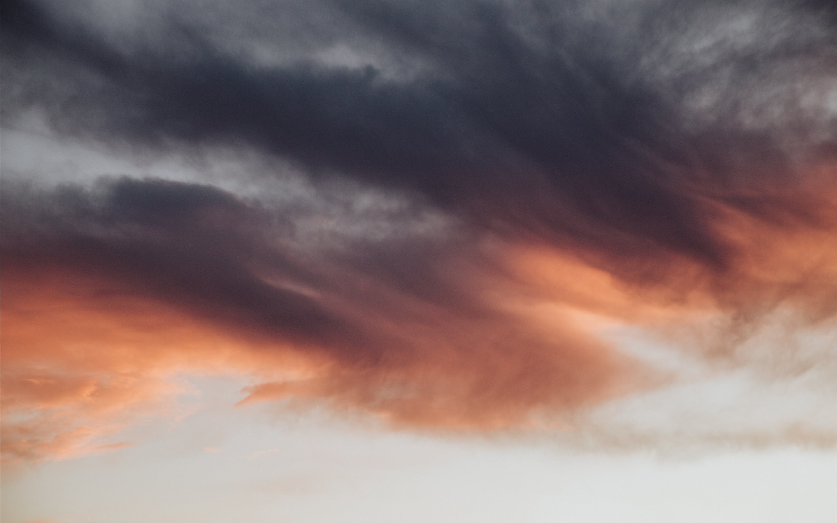 grey and orange clouds MacBook Pro Wallpaper Download