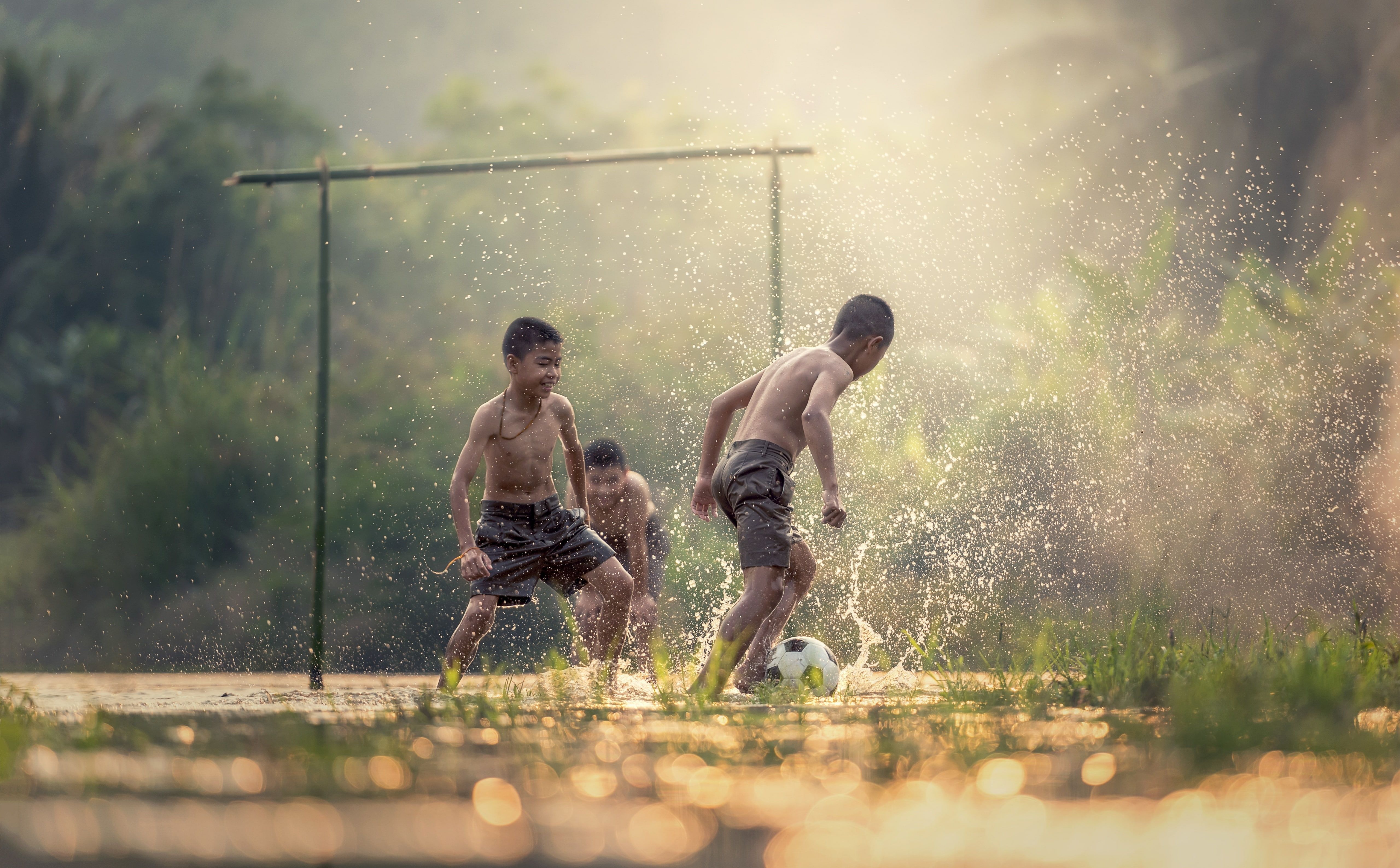 Asian Kids Playing Soccer, boy's gray shorts #Asia #Thailand #Drops #Travel #Nature #Soccer #Happy #Scene #Asia #Wate. Kids health, Soccer, Tilt shift photography