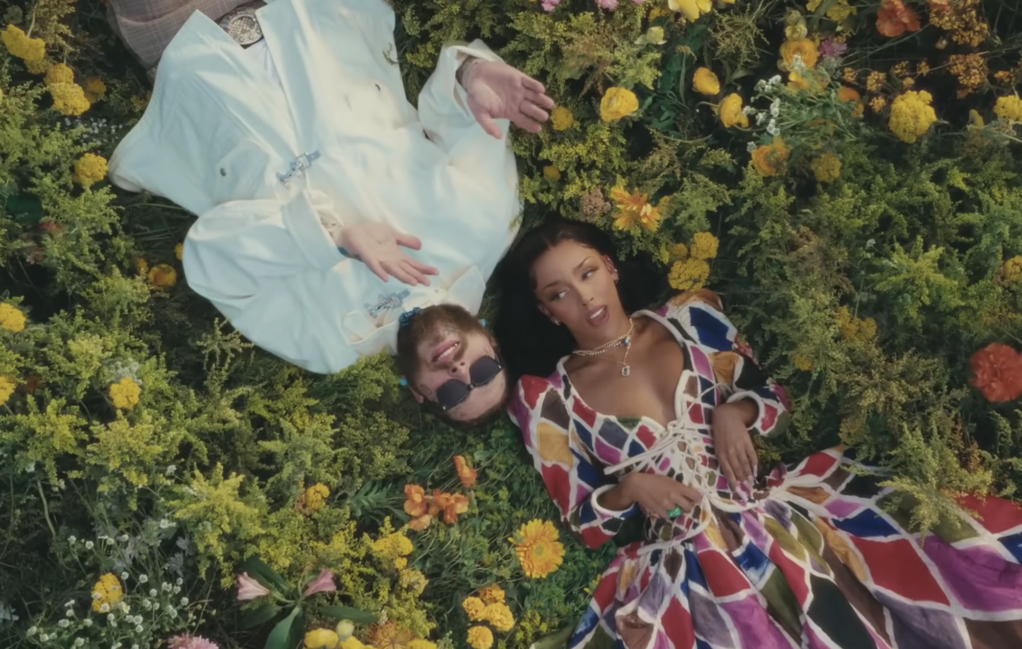 Watch Post Malone And Doja Cat's Flower Filled Video For 'I Like You (A Happier Song)'
