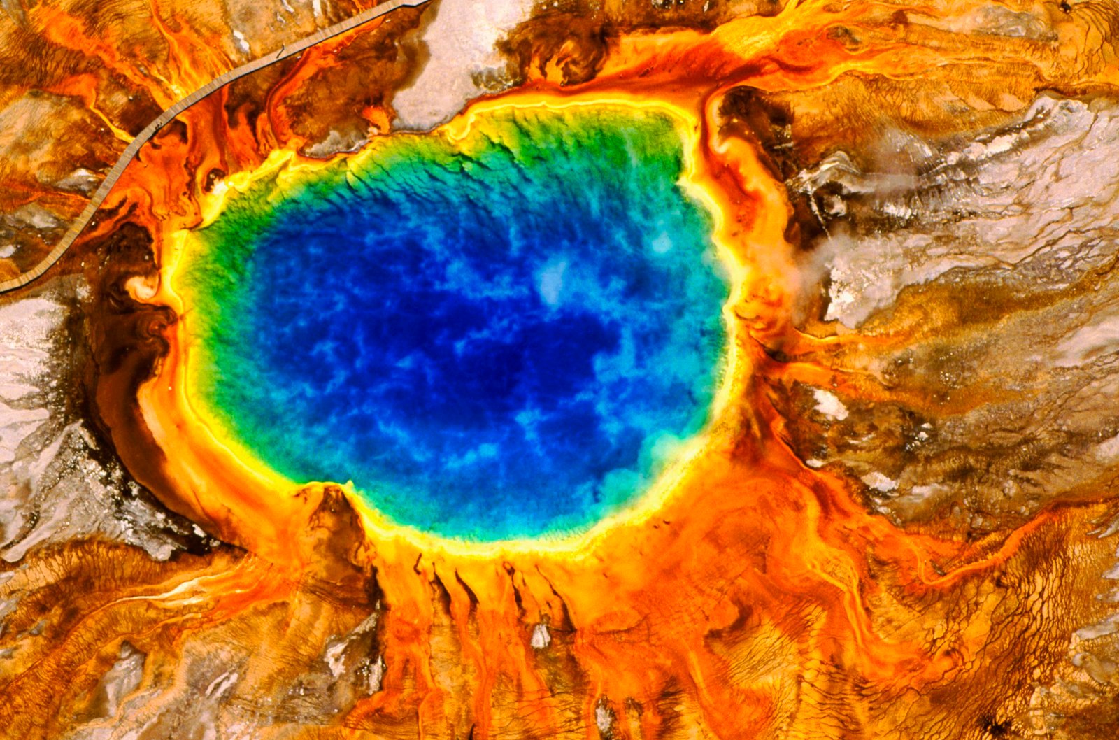 The Science Behind Yellowstone's Rainbow Hot Spring. Travel. Smithsonian Magazine