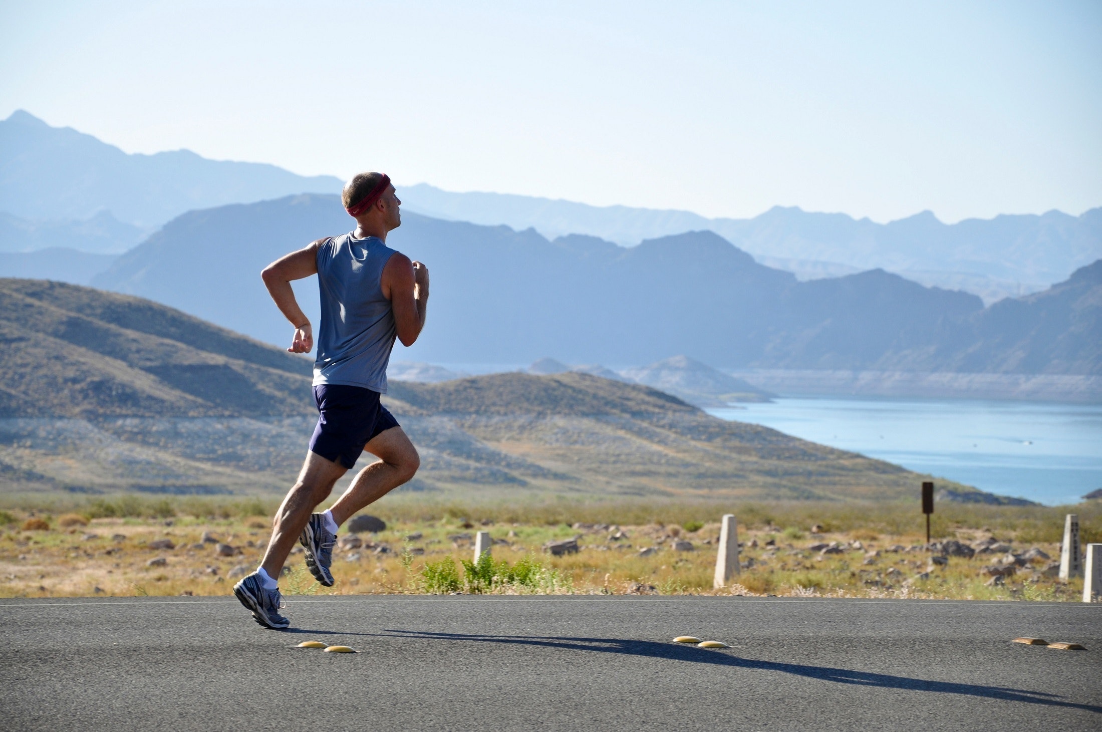 Man Running on Side of Road · Free