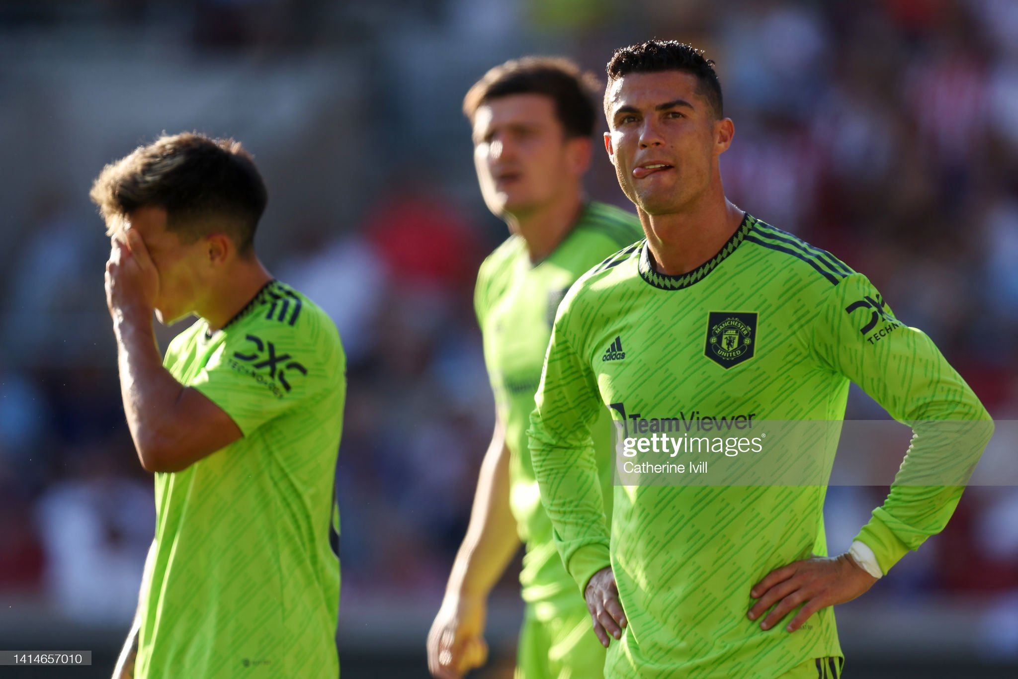 Cristiano Ronaldo and Lisandro Martinez of Manchester United look. News Photo