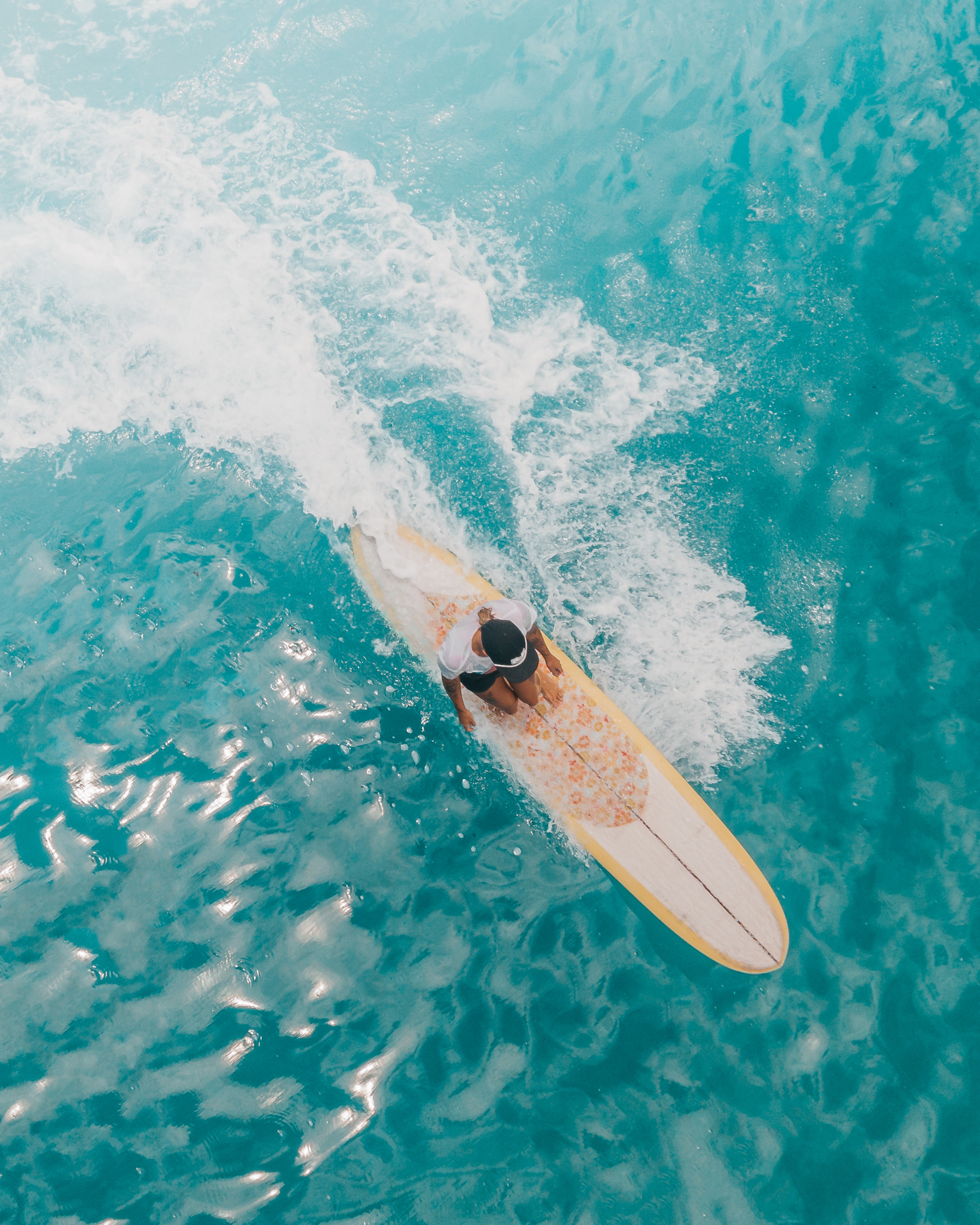 Woman on Yellow Surfboard on Water · Free