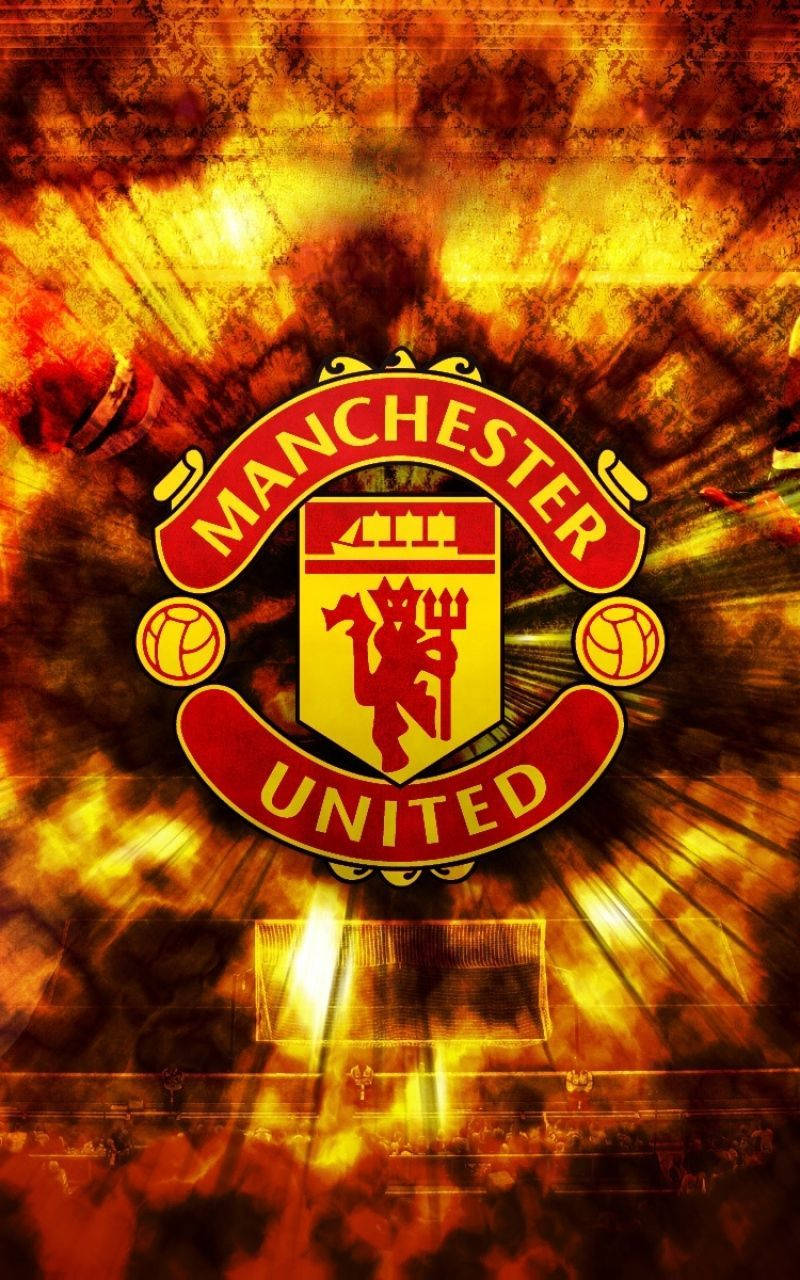 Download Flaming Manchester United Logo Wallpaper