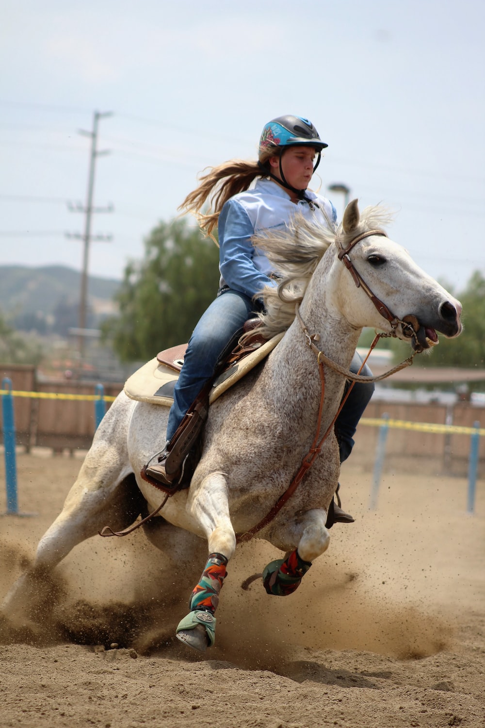 woman riding horse photo