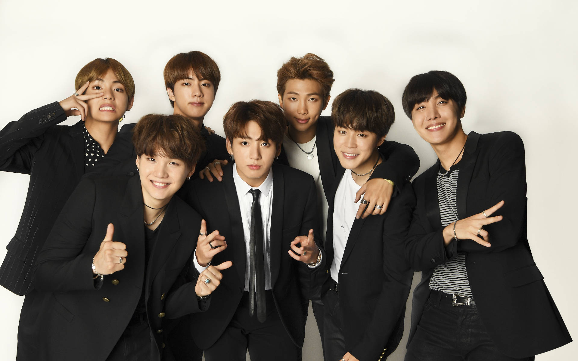 Download Bts Group Photo In Black Suits Wallpaper