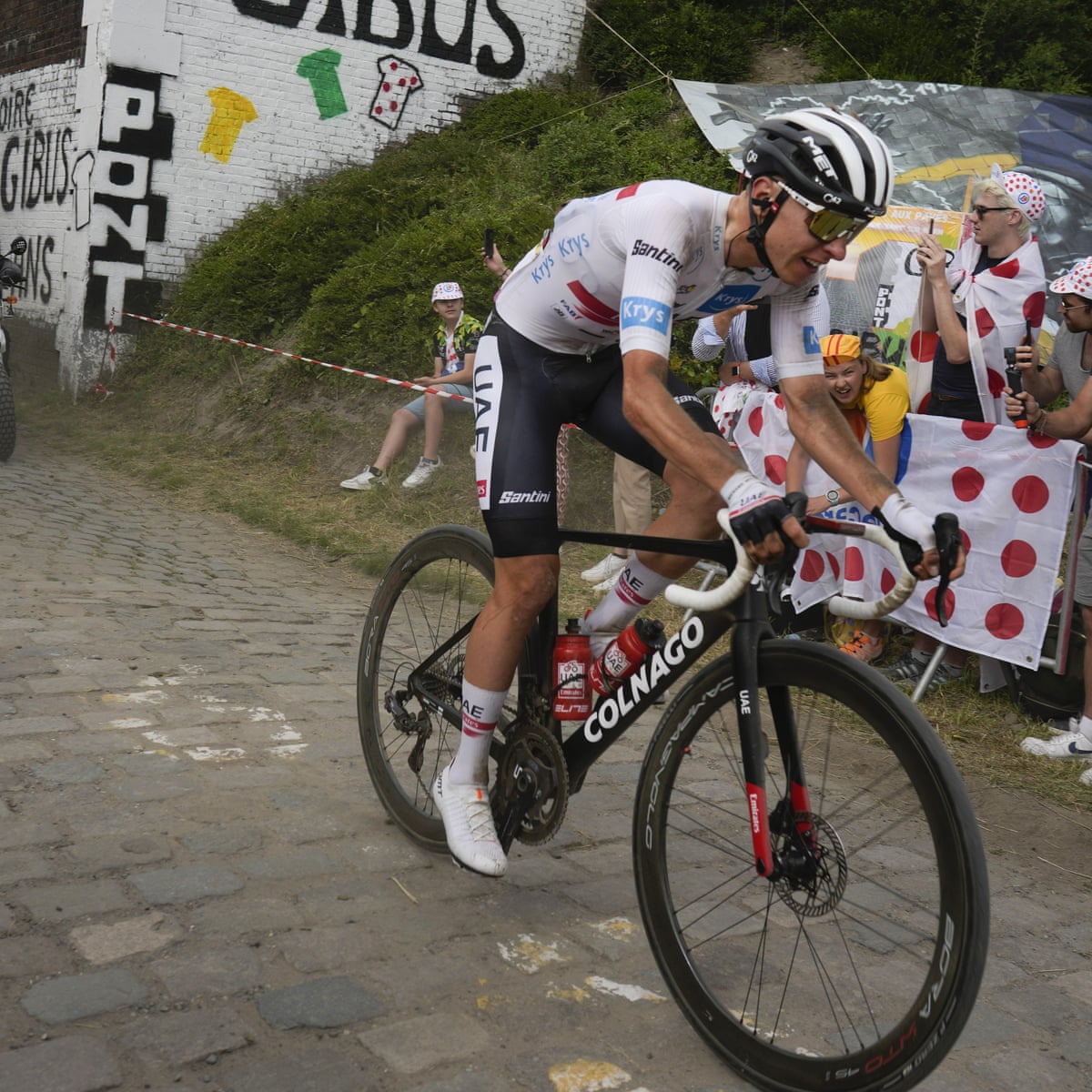 Tadej Pogacar rides through cobbles and chaos to lay down Tour gauntlet. Tour de France