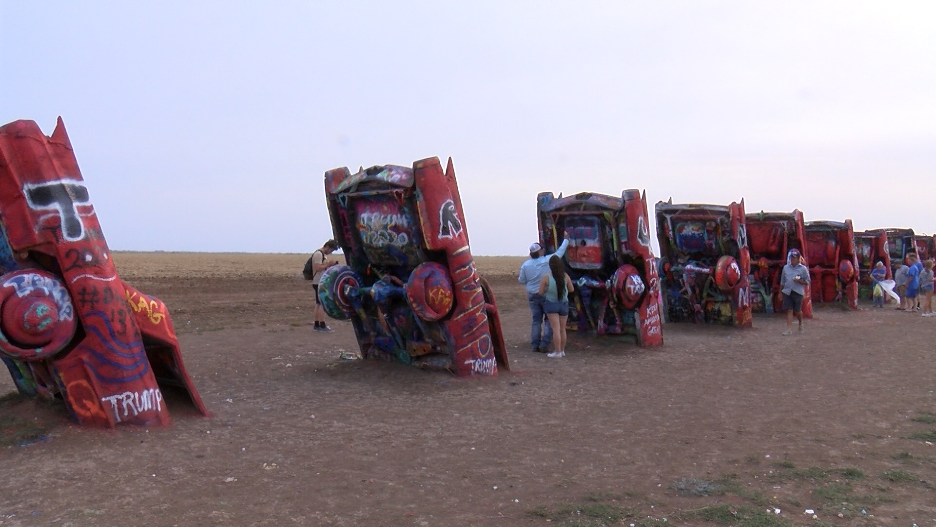 Supporters Paint Pro Trump Messages At Cadillac Ranch Following Singer's Visit