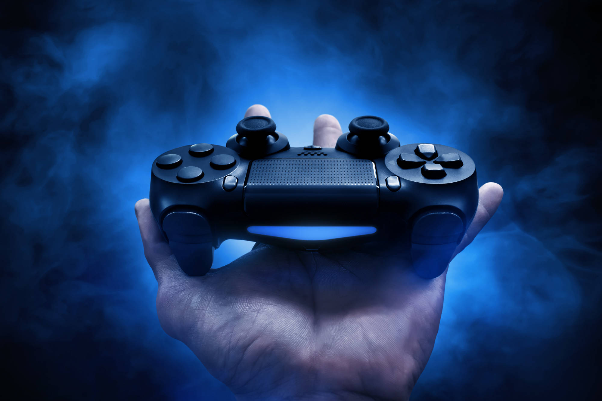 Download Gaming Controller On Hand Wallpaper