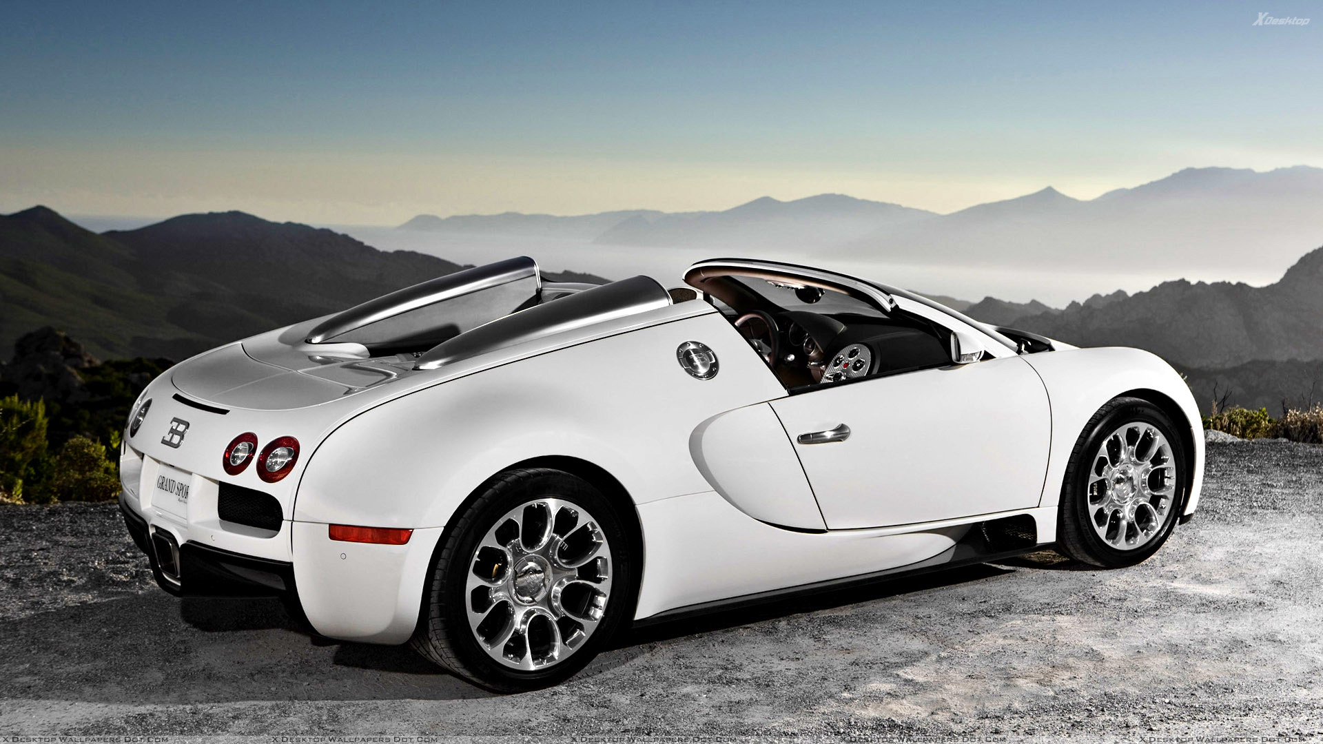 Side Back Pose Of Bugatti Veyron 16.4 Grand Sport In White Wallpaper